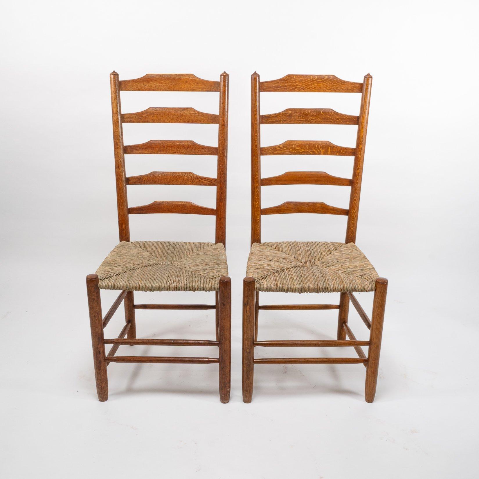 Arts and Crafts Edward Gardiner. Set of Nine English Ladder Back Dining Chairs For Sale