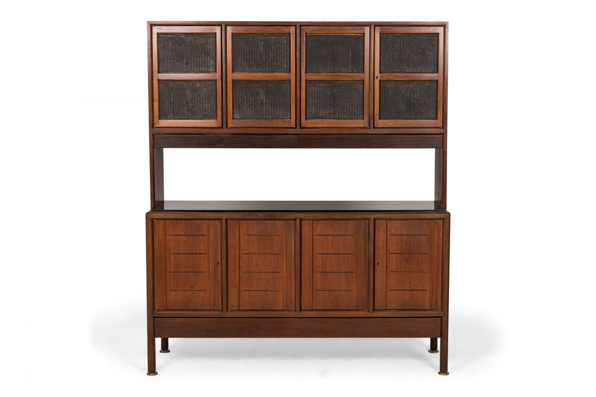 Mid-Century two-section china cabinet / hutch with an upper walnut case with four rosewood cabinet fronts featuring inset Japanese wood blocks depicting pastoral scenes with adjacent character panels that open to reveal four interior two-shelf