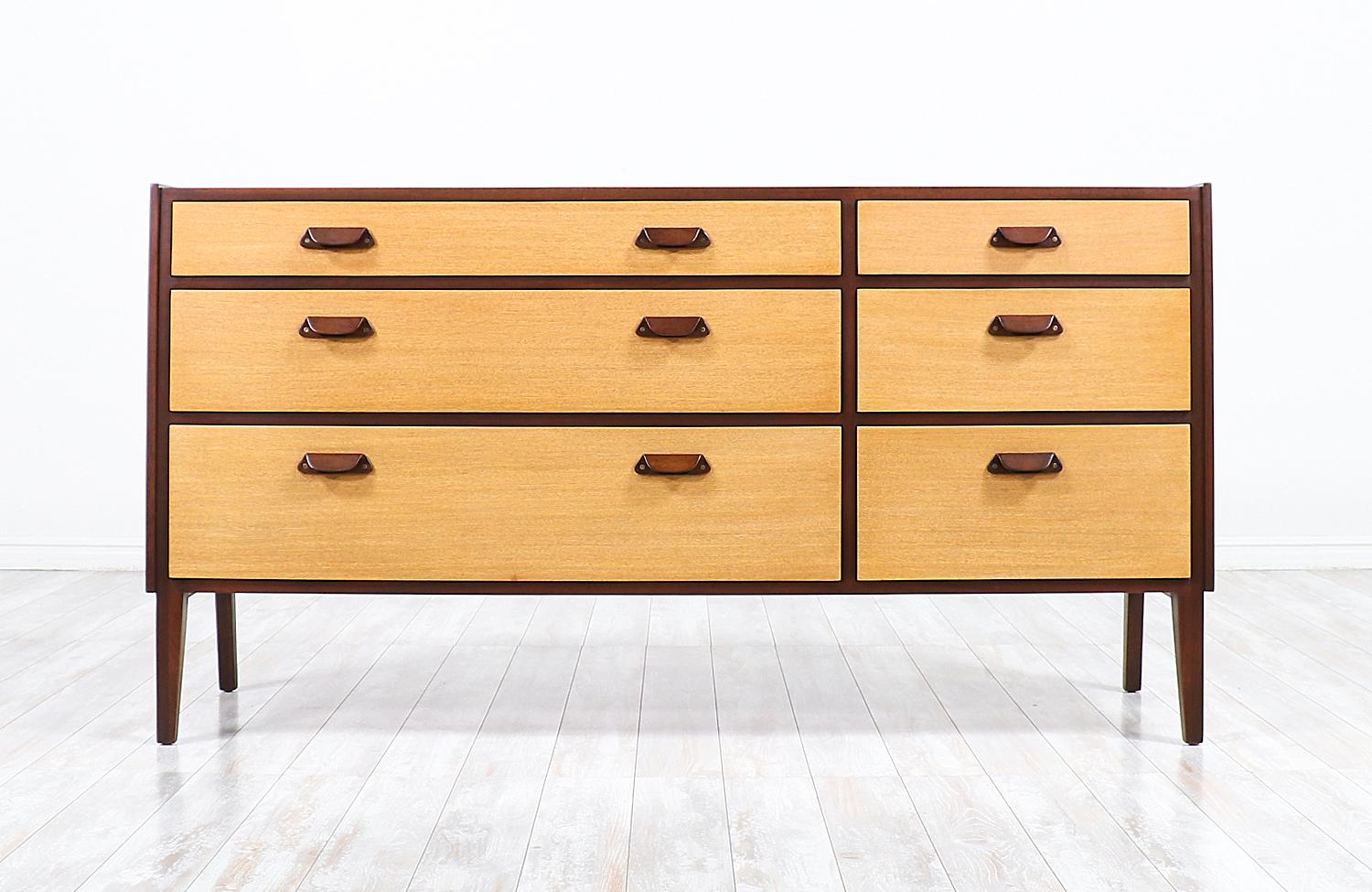 Edward J. Wormley Model-5562 two-tone dresser for Dunbar.

________________________________________

Transforming a piece of Mid-Century Modern furniture is like bringing history back to life, and we take this journey with passion and precision.