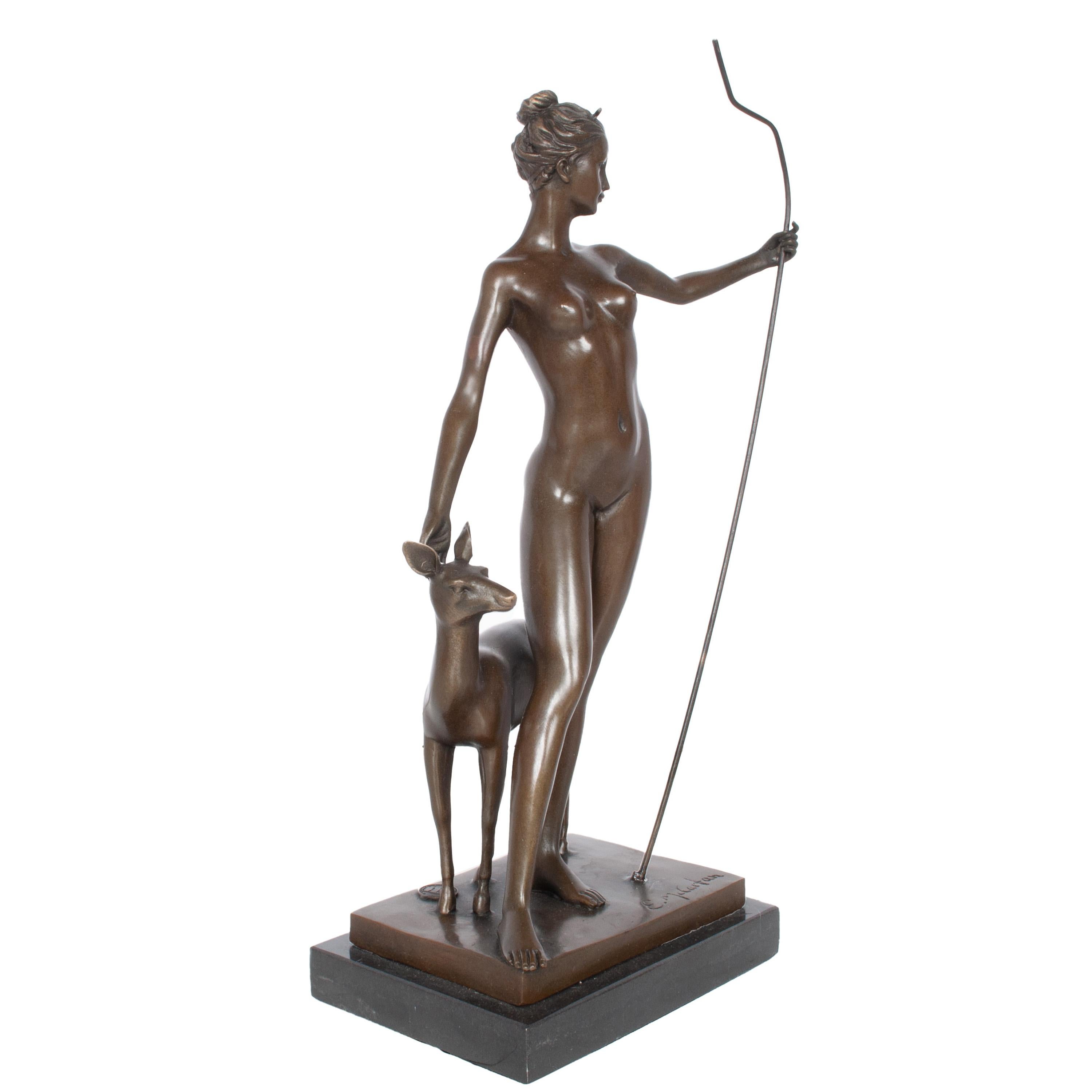 Antique American Bronze sculpture of Diana The Huntress with a Doe, by Edward Francis McCartan (1879-1947), New York circa 1920.
The Bronze depicting the Roman Goddess Diana, holding a staff with her right hand gently touch a deer, the bronze having