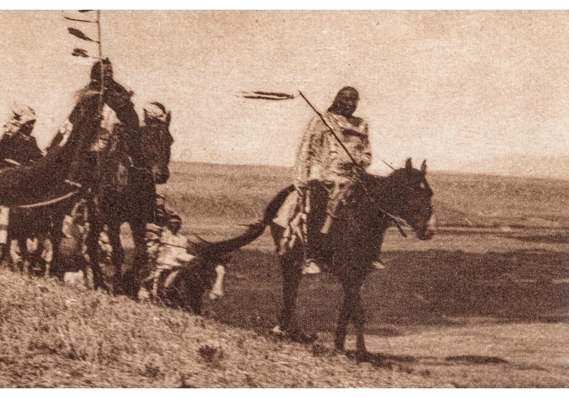 Acrylique Edward S. Curtis (1868-1952) Rare photogravure Sepia intitulée Atsina War-Party en vente