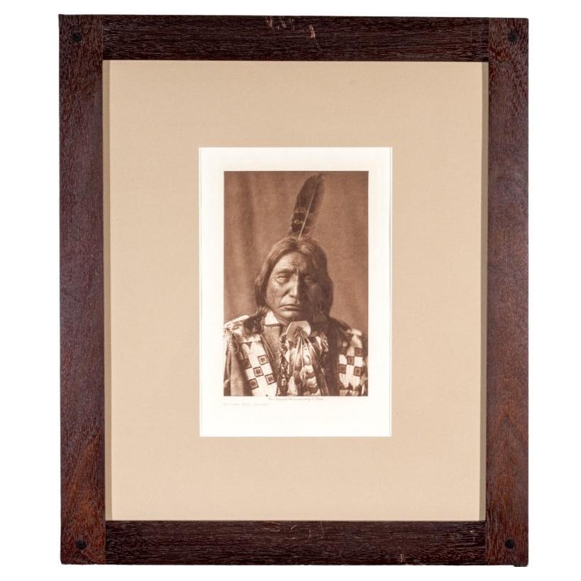 Edward S. Curtis (1868-1952) Rare photogravure Sepia intitulée « En liège taillé - Brule