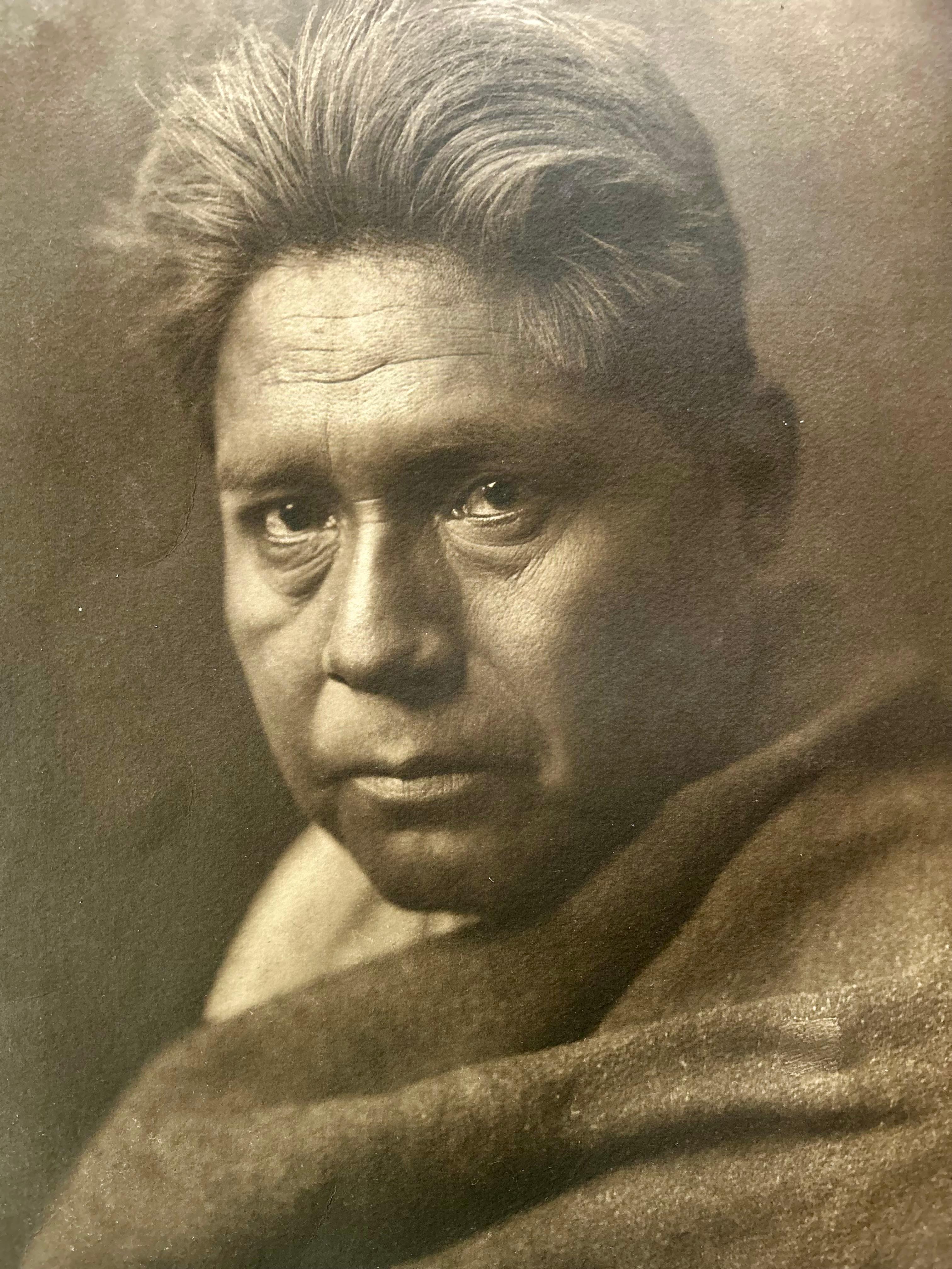 Edward S Curtis (1868-1952)
Title:  Shijako – Pima 
Plate: 47
Portfolio: Volume 2 
Printer: John Andrew & Son
Medium: Photogravure
Date: 1907
Dimensions: 
Sheet: W 18 H 22
Image: W 11 ¾  H 15 ¾ 

A truly compelling portrait, this image captures a