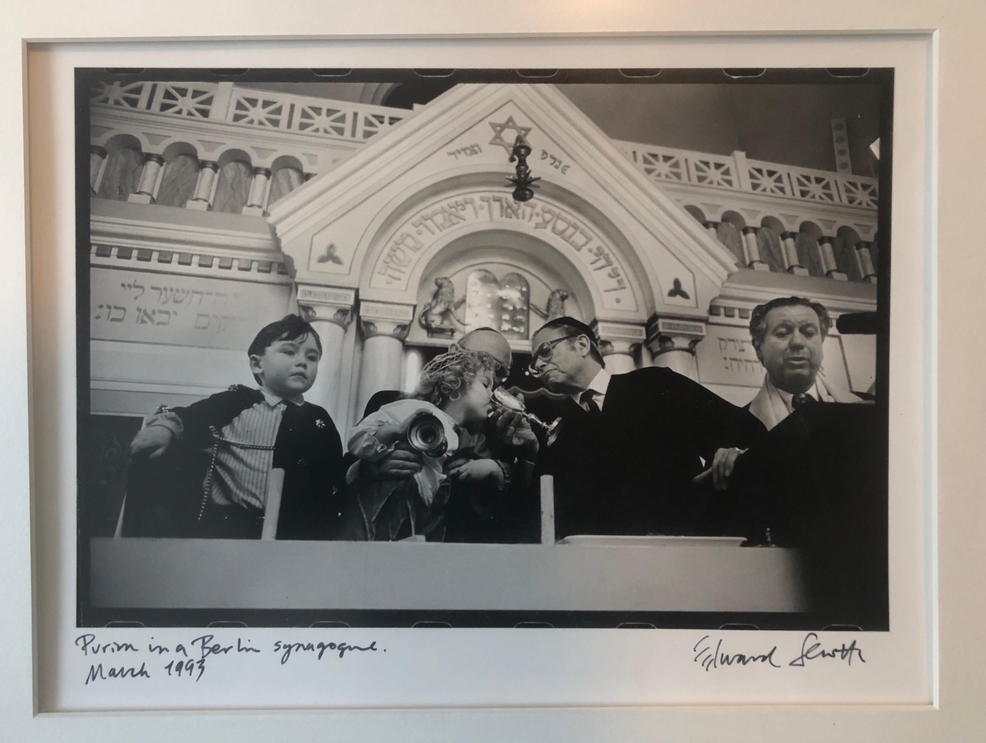 
Edward Serotta
Purim in the Pestalozzi Strasse Synagogue Berlin.
 silver gelatin print, matted, captioned by hand and hand signed and numbered. B/W photographs documenting Jewish life in Eastern and Central Europe. 
Edward Serotta is a journalist,