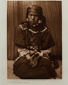 "Touch Her Dress - Kalispel, " Sepia Photograph on Japanese Vellum by E.S. Curtis