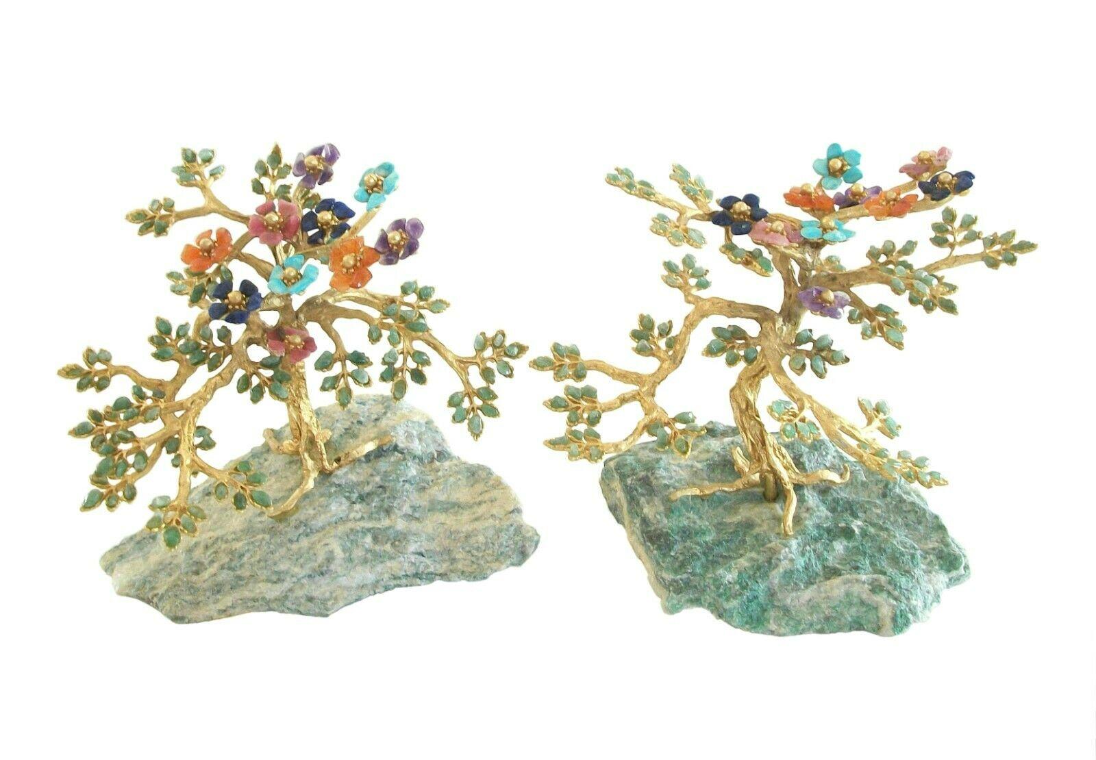 Edward Swoboda - Rare complementary pair of Hollywood Regency gem trees on natural green Jadeite bases - fine quality workmanship and details - each tree featuring Turquoise, Tanzanite, Amethyst, California pink Tourmaline and Citrine semi precious