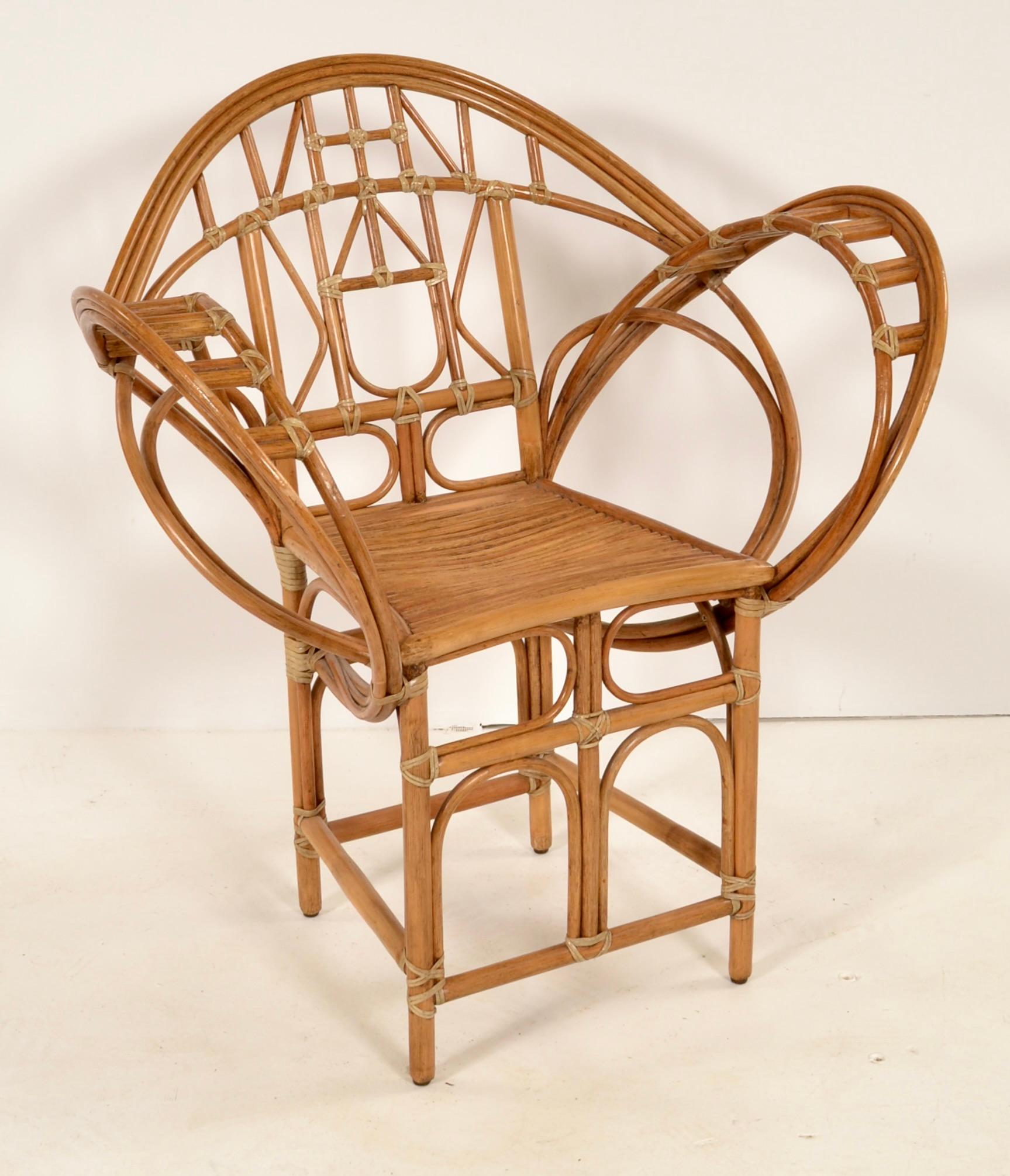 Designed by Edward Tuttle for McGuire's Coastal Collection, this example of the sculptural peacock chair, known to many as the 