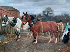 Victorian English 19th century farm yard scene with Shire Horses and a couple