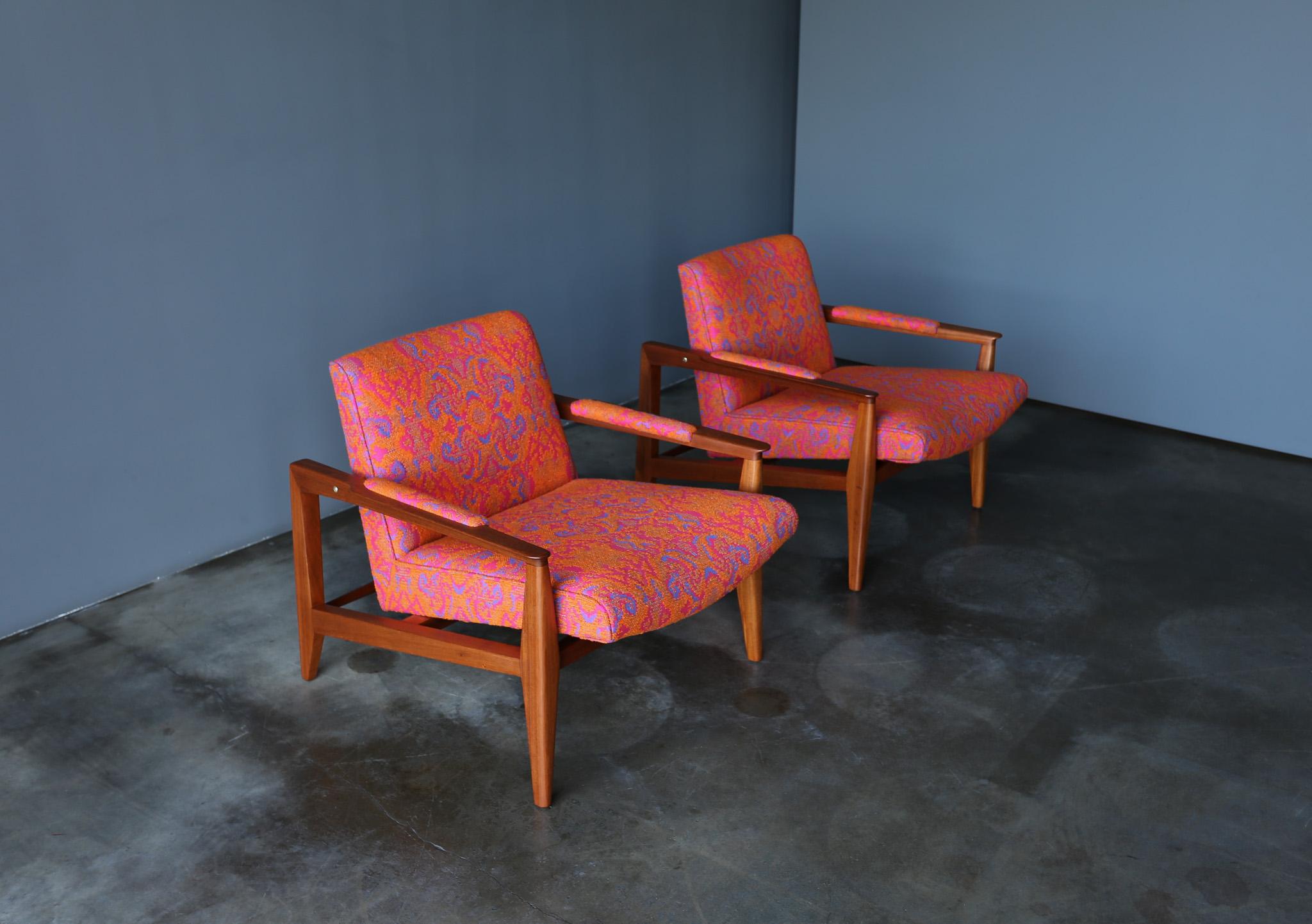 Edward Wormley 5499 Lounge Chairs for Dunbar, United States, c.1960.  This pair has been expertly restored in New Old Stock Orinoka Mills Fabric originally specified by Dunbar.  Each chair retains the original Dunbar brass plaque to the bottom. 