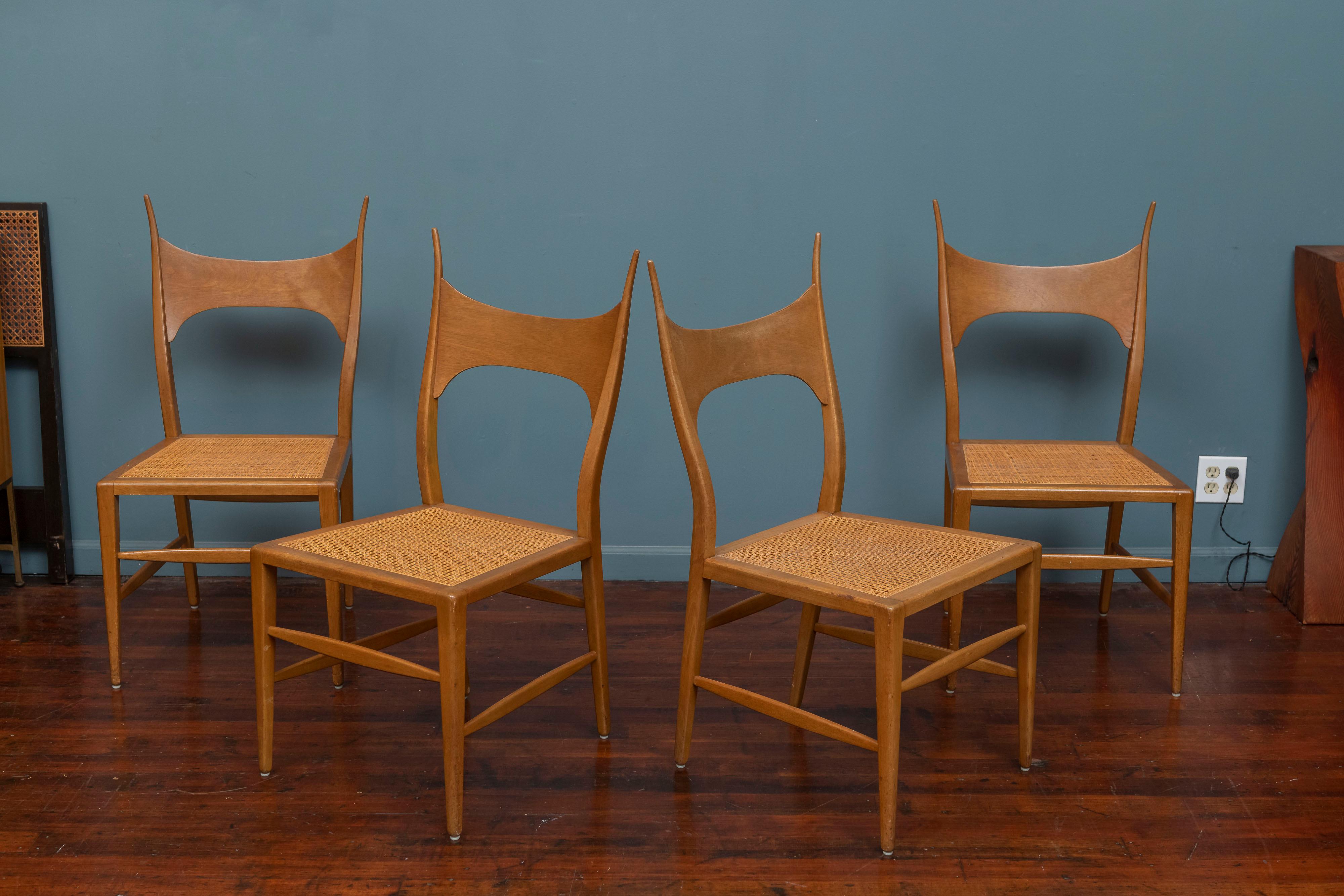 Edward Wormley design antler dining chairs for Dunbar, Model 5580. 
Rare and attractive design chair by Wormley in the height of his design career. Frames are bleached mahogany with cane seats. The chairs are elegant and beautiful but a little