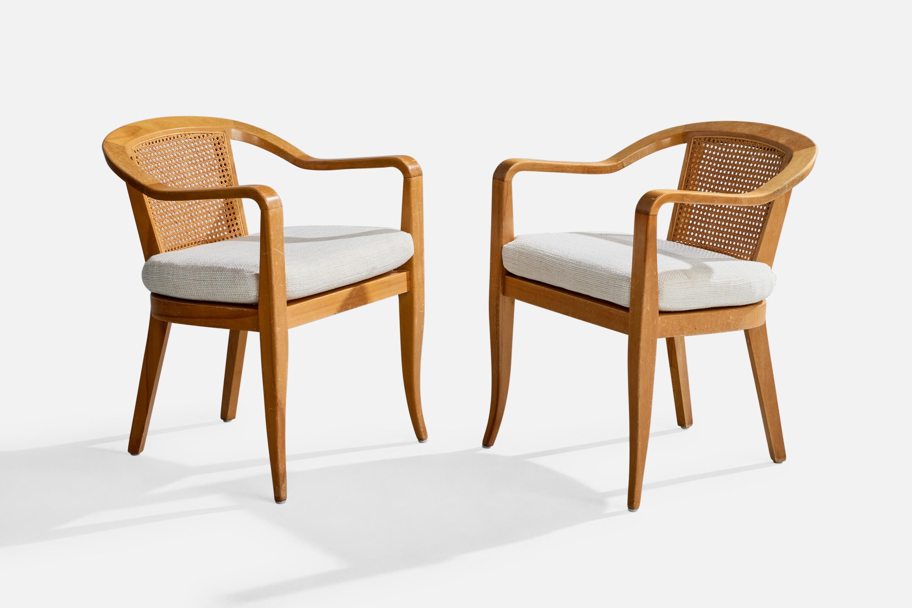 A pair of wood, cane and white fabric armchairs or side chairs attributed to Edward Wormley for Dunbar, USA, c. 1950s.

Overall Dimensions (inches): 29.25