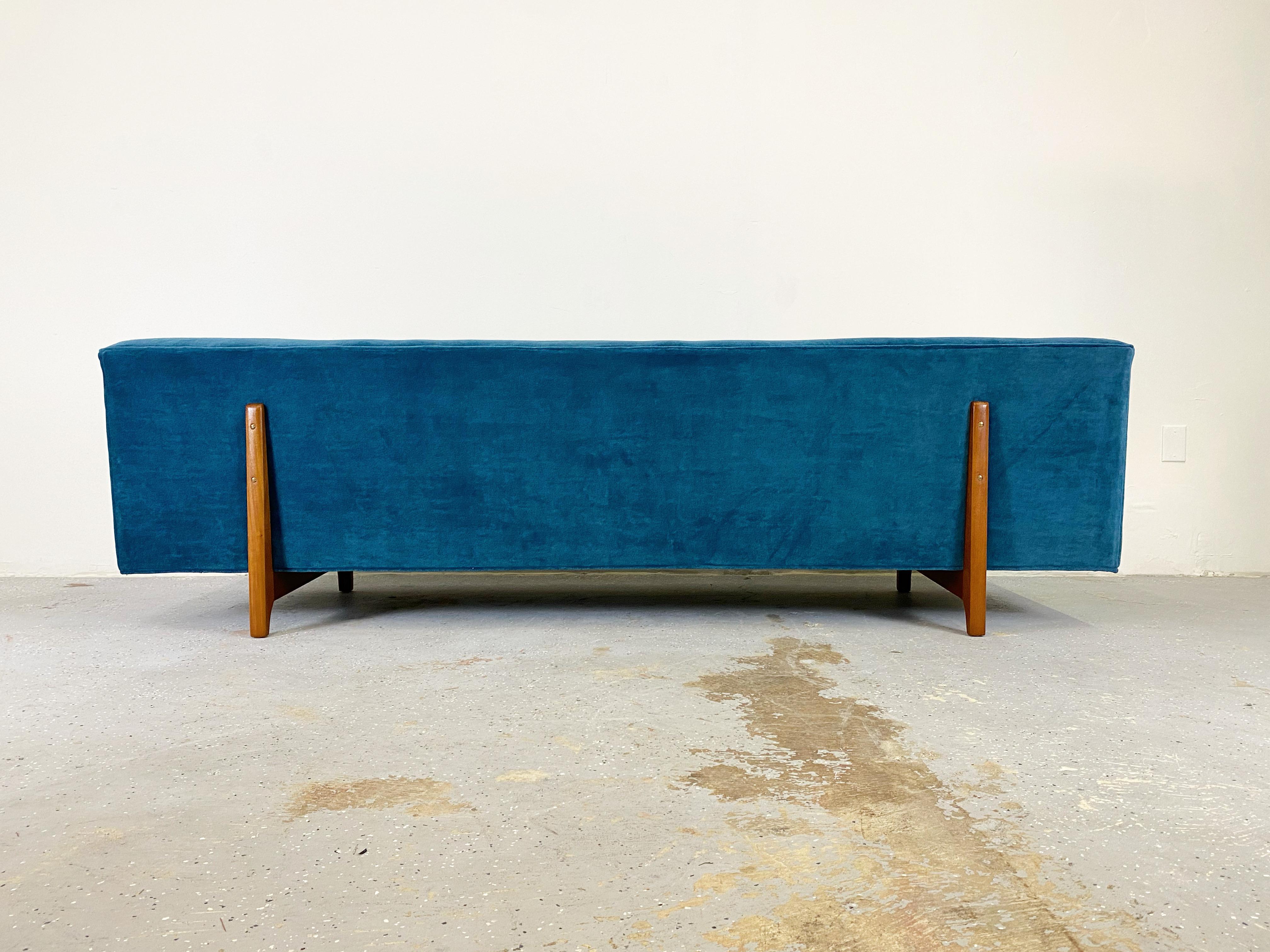 Classic bracket back sofa by Edward Wormley produced by Dunbar. Newly upholstered in mohair velvet with new foam.
