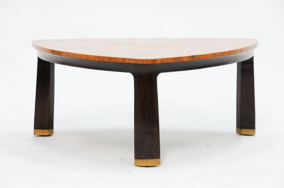 Edward Wormley coffee table for Dunbar. Table has an elm top and solid brass feet.