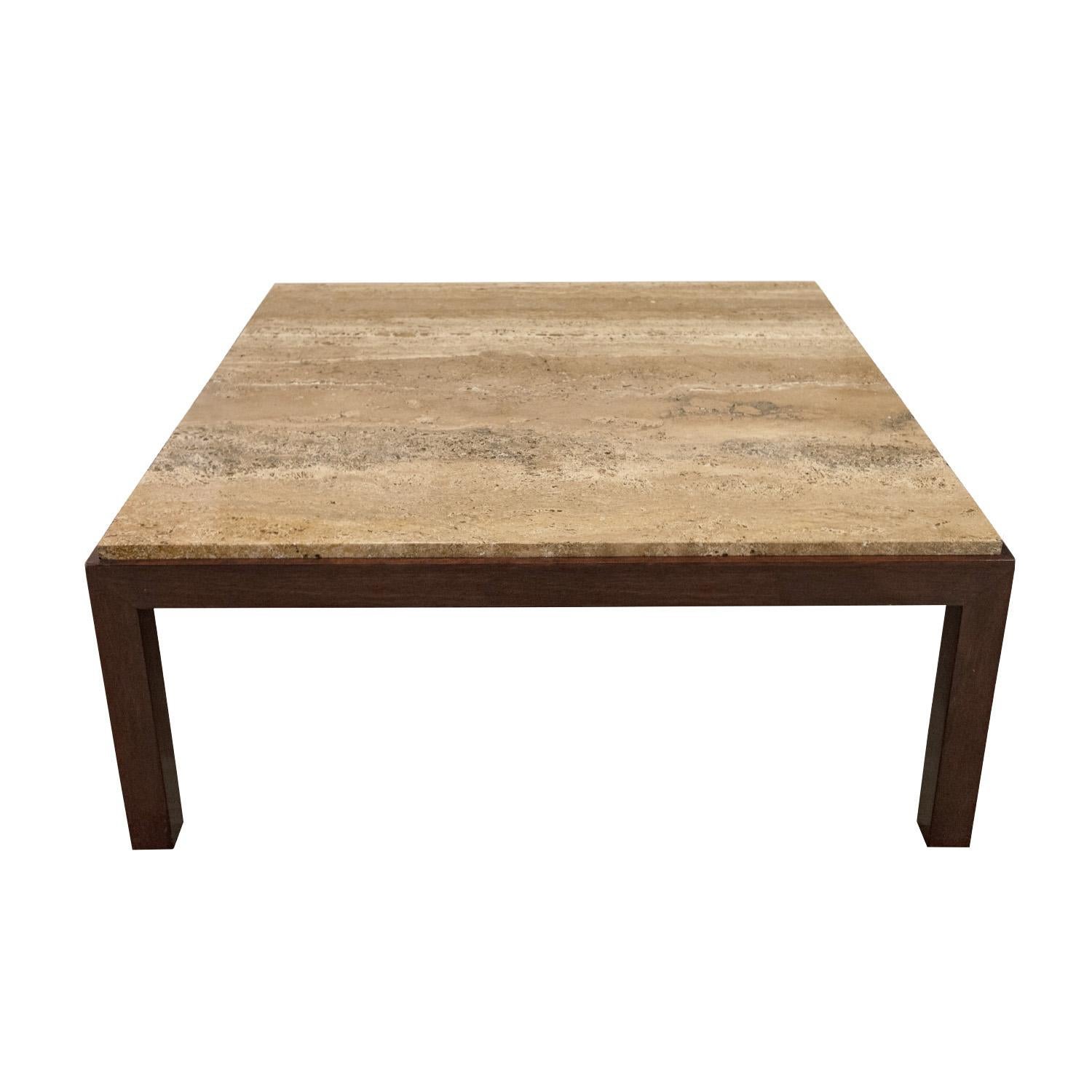 Parsons style coffee table model No. 5206, base in dark mahogany with inset Italian travertine top, by Edward Wormley for Dunbar, American 1952 (metal and paper labels on bottom). Edward Wormley was known for his elegant designs utilizing