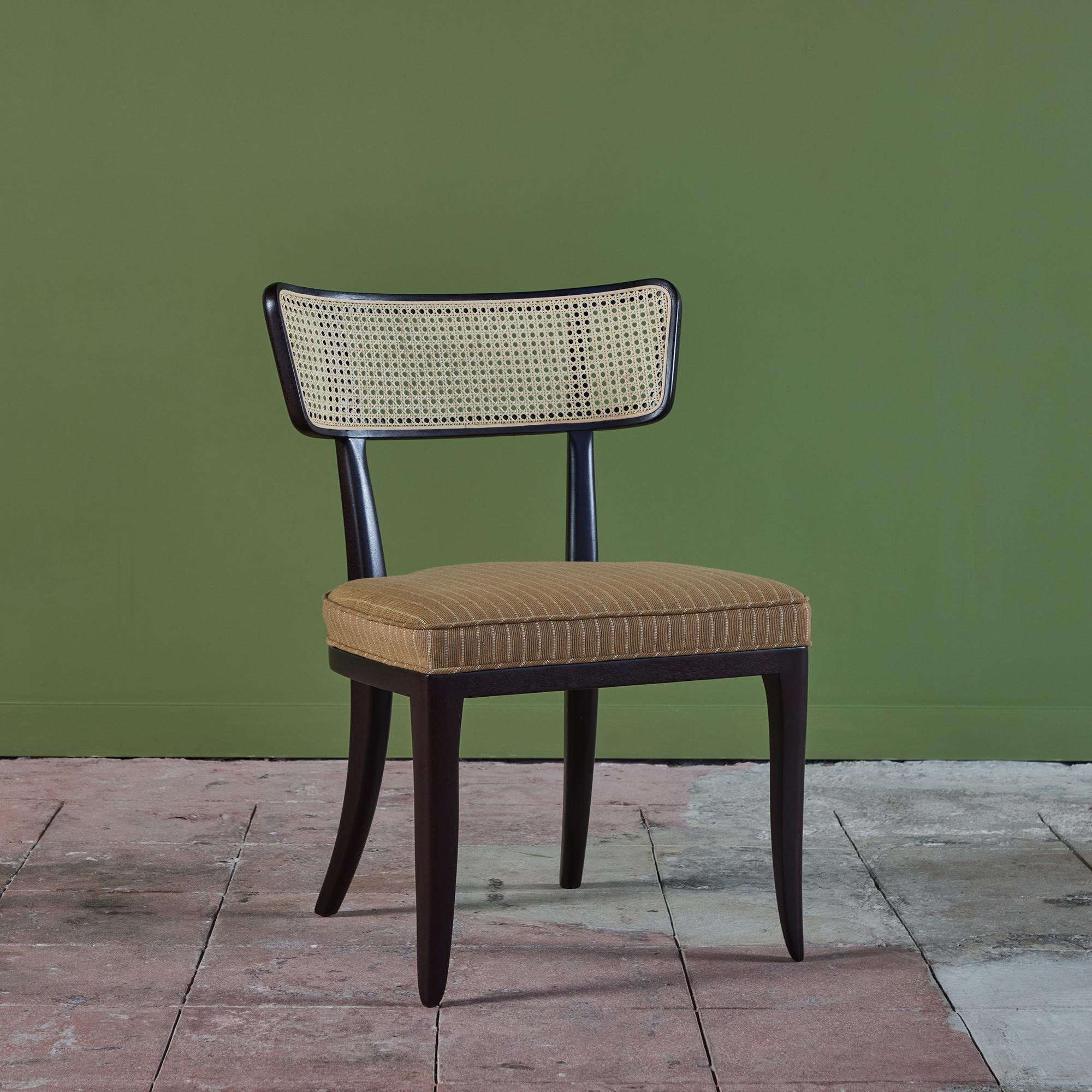 A mahogany ebonized side chair by Edward Wormley for Dunbar, USA, c.1960s. The backrest has been newly caned with a newly upholstered seat cushion. Retains Dunbar brass label.

Edward Wormley was a longtime director of design for the Dunbar