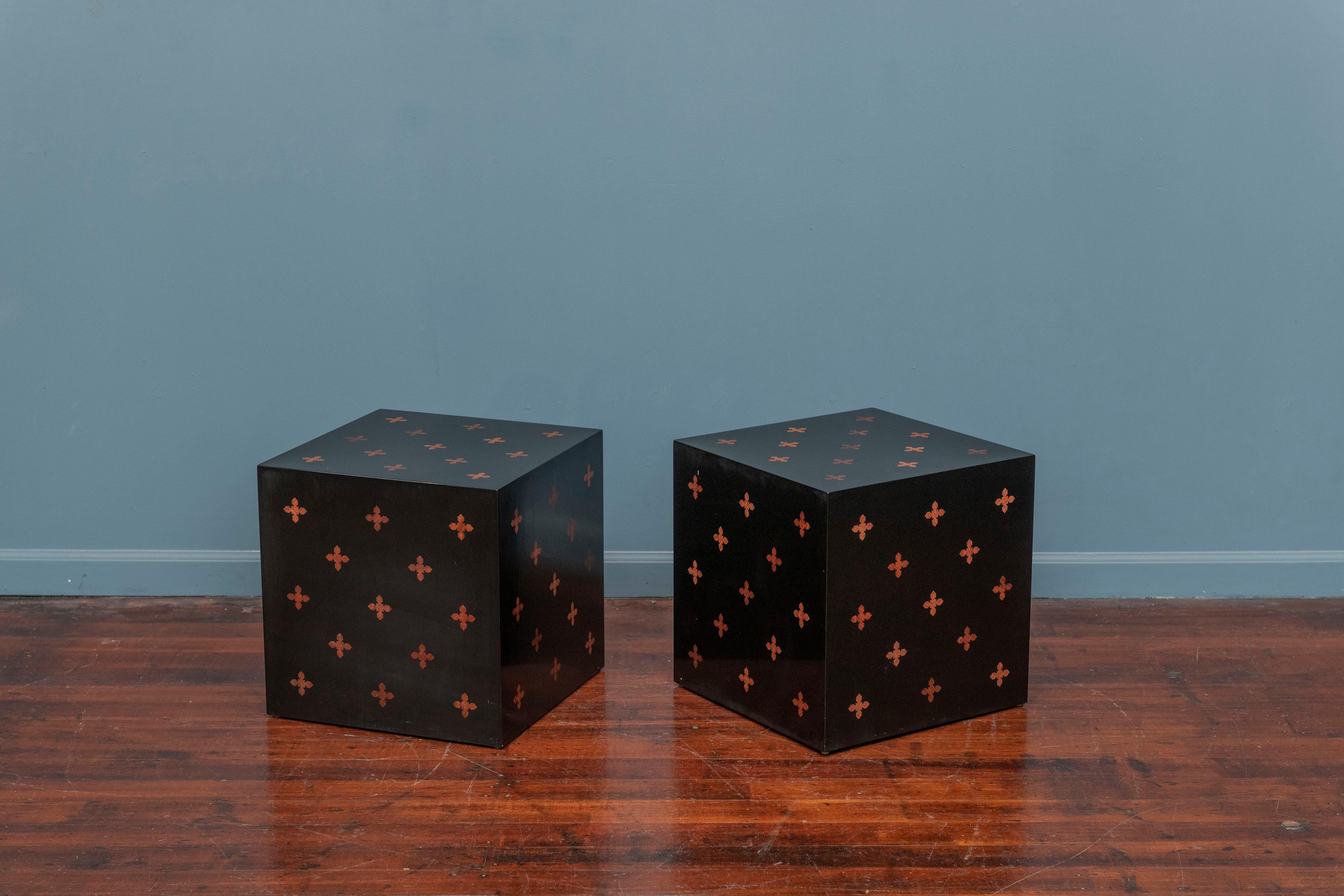 Edward Wormley design cube tables for Dunbar Furniture Co. Rare original pair of end or side tables in black laminate with mahogany parquetry inlay. Very good original condition with expected age related fractures to the laminate without being