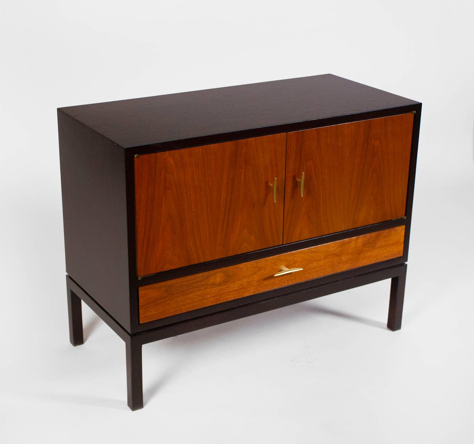 Dunbar small bedside cabinet or night stand Model #475 B with a satin dark espresso finish on the body and satin walnut doors and solid brass hardware. Fully restored.