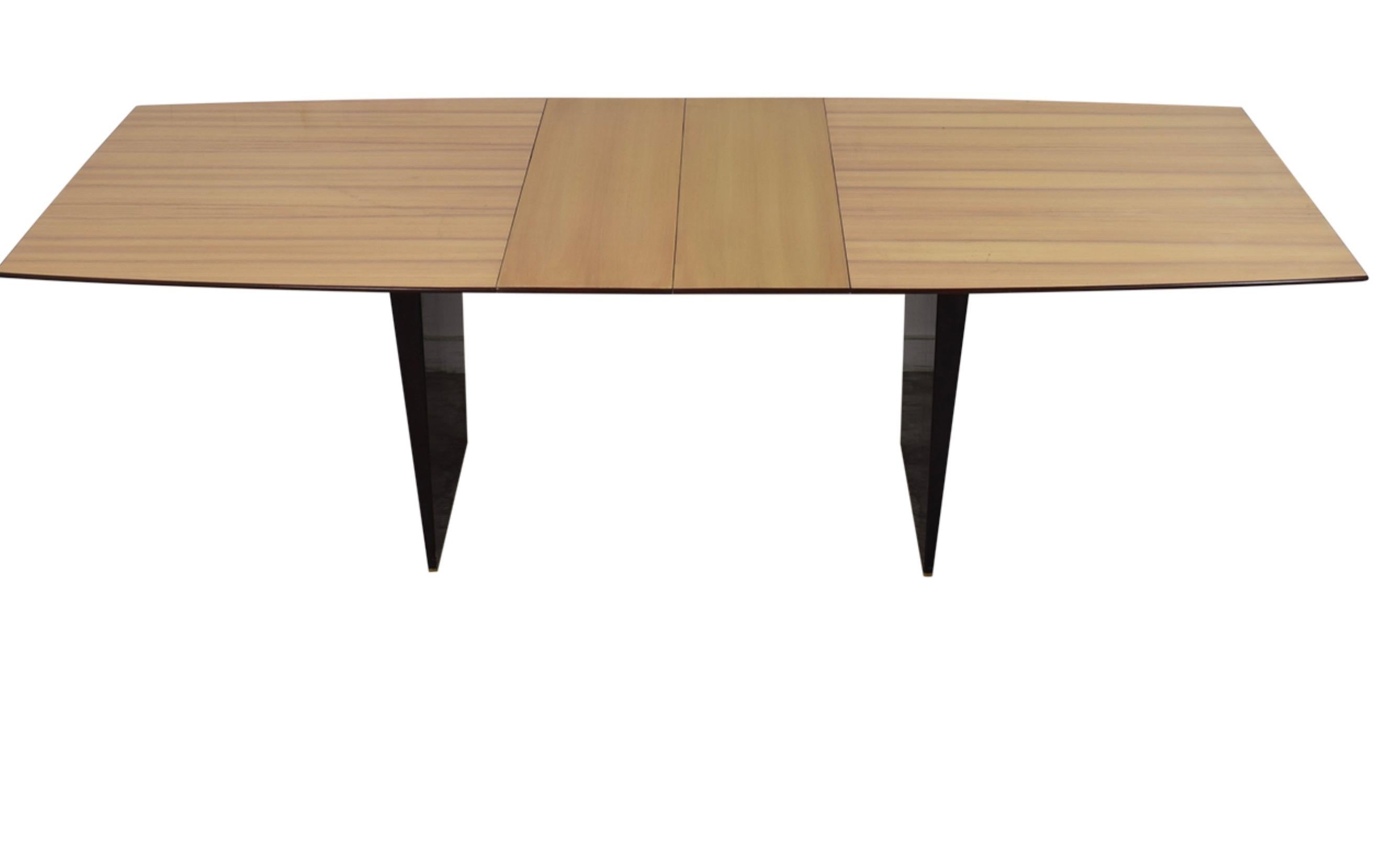 Edward Wormley Dunbar model 5460 dining table, 1954, Tawi, mahogany, brass
72 (84, 96, 108”) W × 42 D × 29 H in 
183 × 107 × 74 cm

Extremely rare piece. Original owner was very protective and used vinyl edge protection to protect original