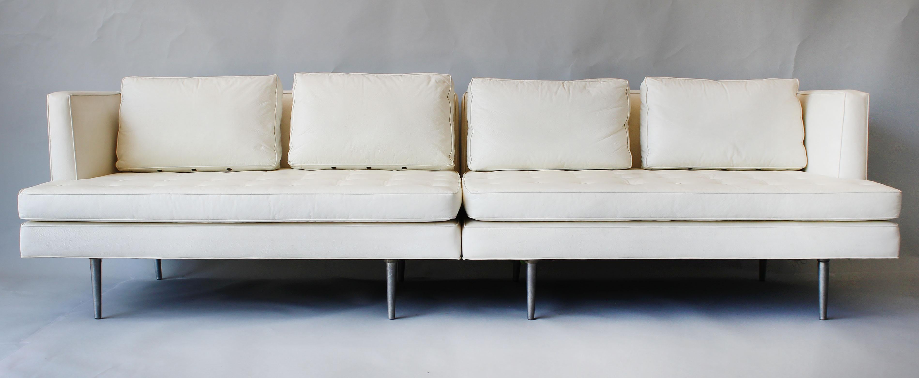 A two-piece sectional sofa, model number 4908, designed by Edward Wormley for Dunbar Furniture. This low profile sofa is one of the most comfortable modern pieces you will ever sit on. Can be used as shown or as settees opposing one another or as a