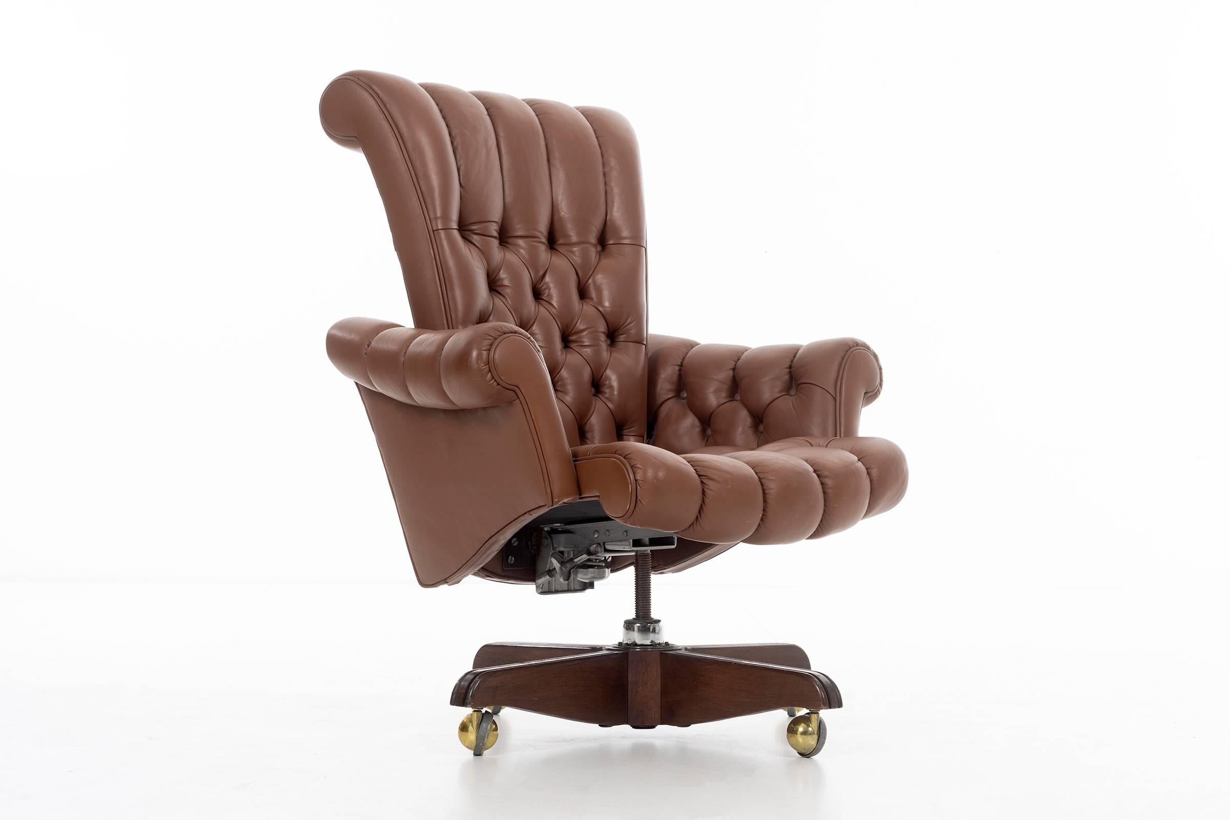 Wormley for Dunbar, high-back desk chair, model 932 diamond tufted button leather with scroll arms and back, tilt swivel, adjustable height, on solid walnut base with casters.
Big D label on underside
Note: Four available.