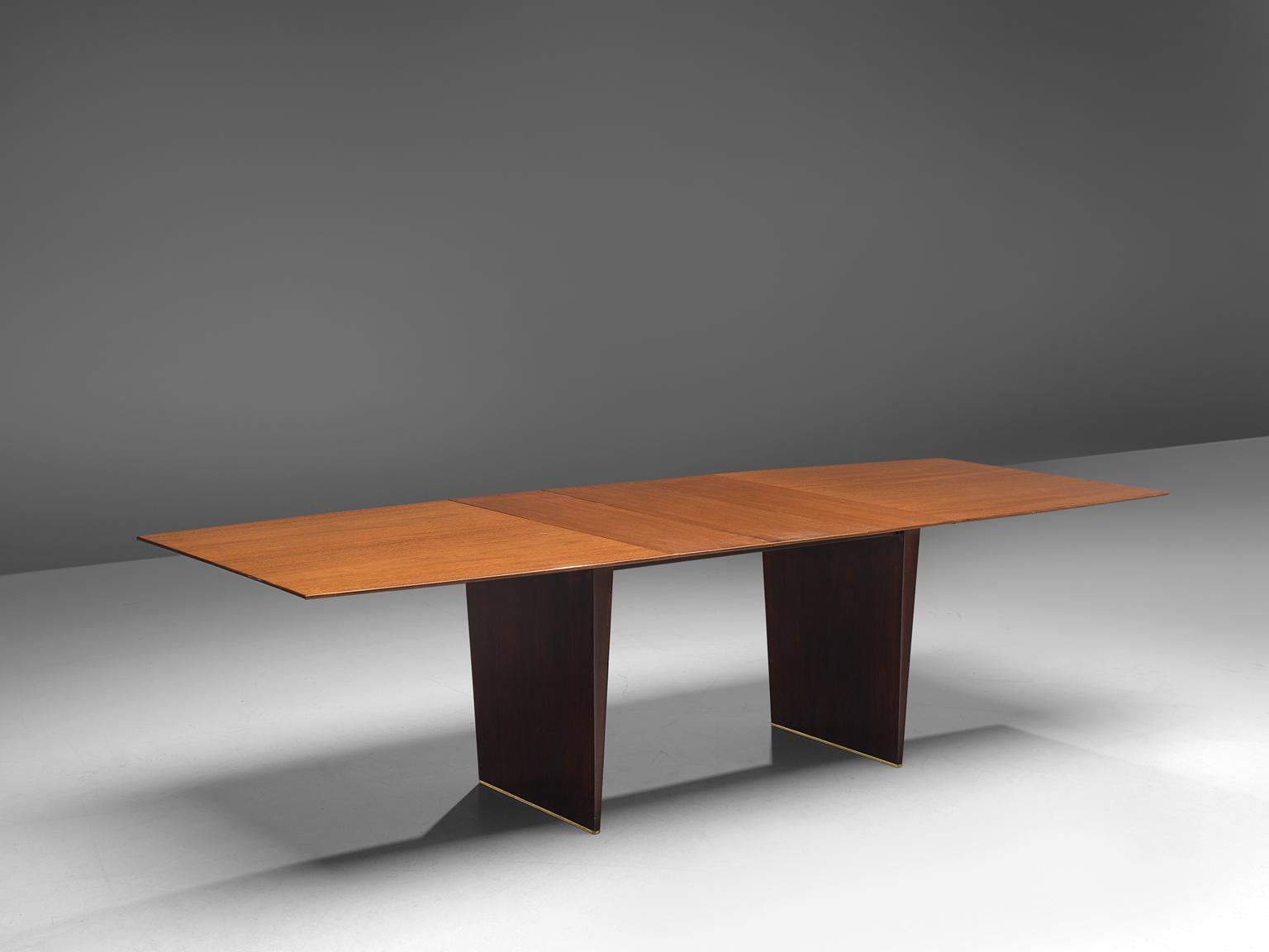 Edward Wormley for Dunbar, dining table, tawi wood, The United States, 1960s.

Wonderful boat shaped dining table, designed by Edward Wormley in the 1960s. The lacquered tabletop is made of tawi wood, which has a beautiful warm, honey color combined