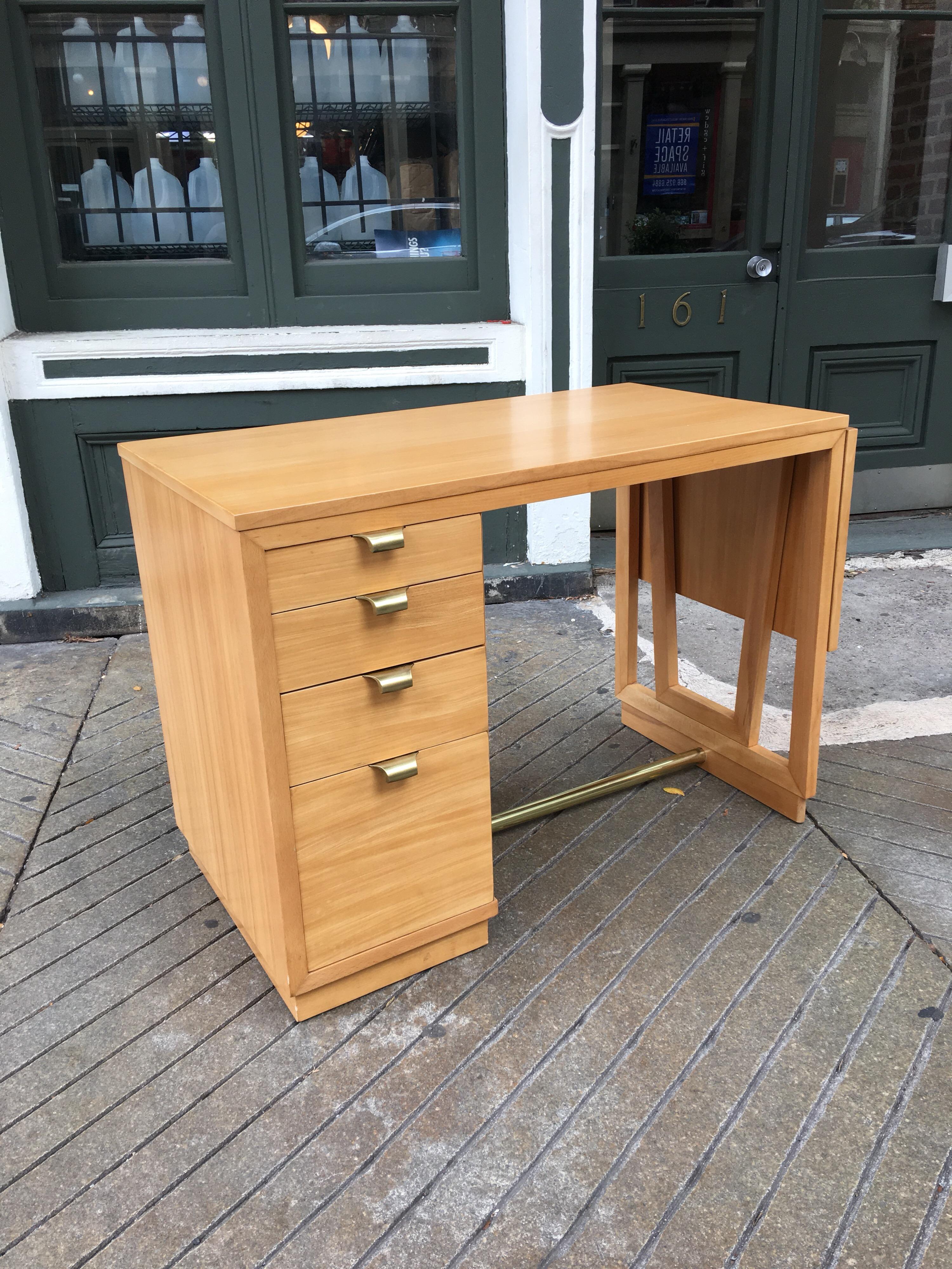 Edward Wormley for Drexel Precedent collection drop-leaf desk in silver elm. Completely redone and ready to go! Fold up leaf adds additional work surface. Brass polished handles add a nice compliment to the light finish. Uncommon form from this