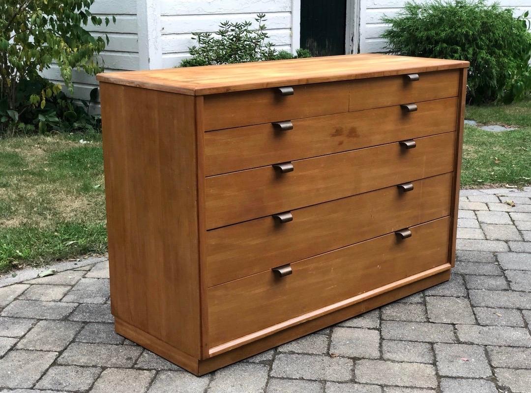 Early 1950s Edward Wormley designed chest of drawers, all original. Manufactured by Drexel Furniture.
Age appropriate wear but structurally sound. Original brass pulls and dividers. Could use a refinishing one wanted it to be brought back to its