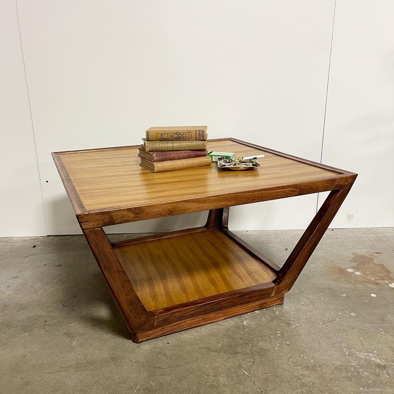 Mid century Trapezoid coffee table. Edward Wormley for Drexel. Good condition piece with minimal ware! Out of Drexels Precedent line. Very well made and sturdy piece ready for all your cocktails and puzzles!