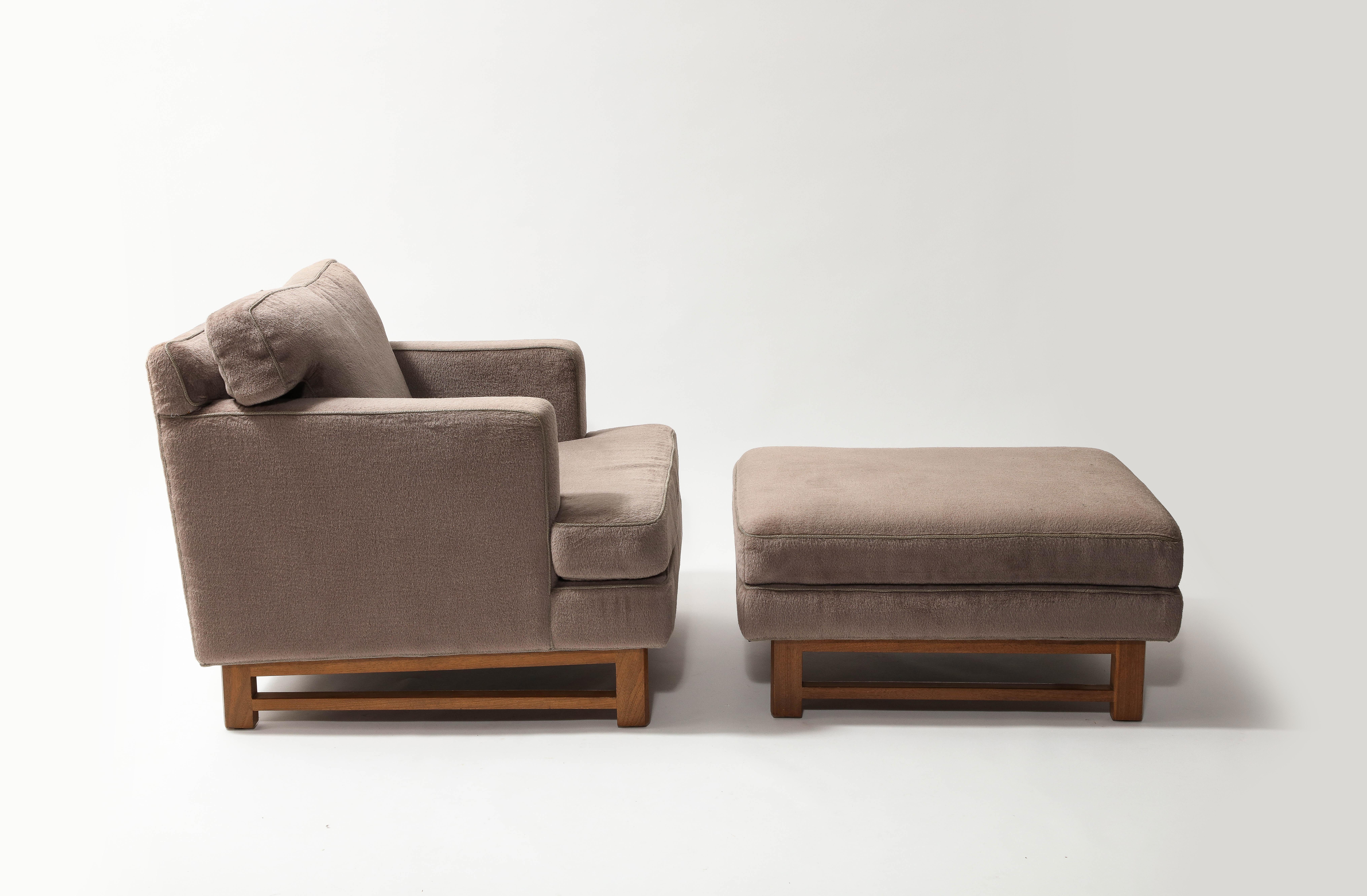 Classic lounge chair and ottoman by Wormley for Dunbar. Wood framed bases. 