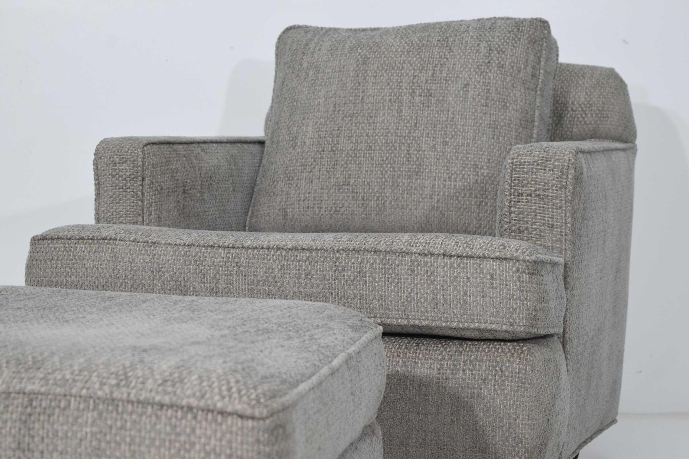 A beautiful and super comfortable lounge chair by Dunbar. Chair has what seems to be fairly new upholstery in a beautiful silky chenille tweed. Ottoman dimensions are 28.5