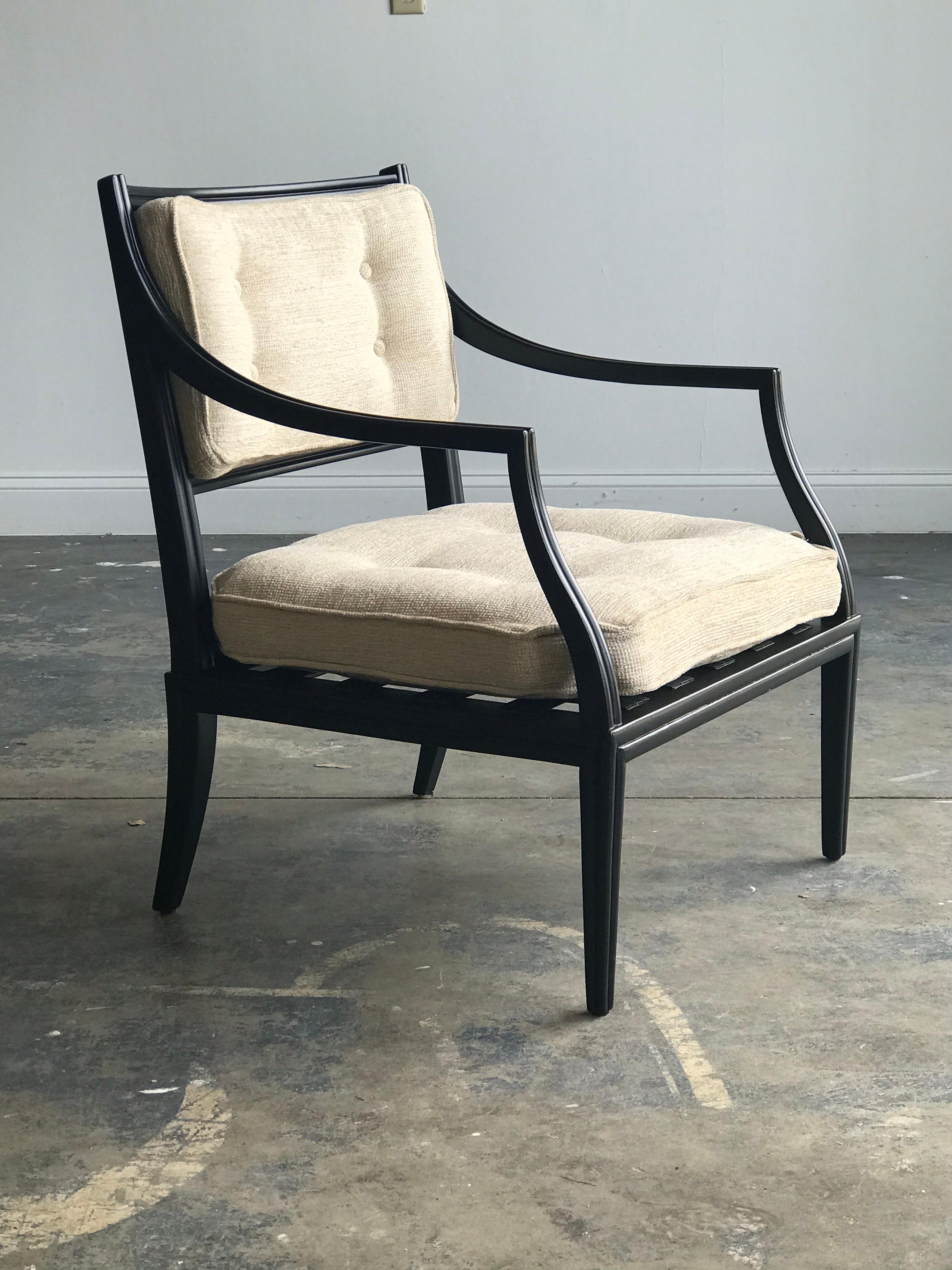 Unusual armchair by Edward Wormley for Dunbar. Graceful lines and stunning details. Ebonized frame with oatmeal/ beige upholstery. Model 6309.

Swatches available if needed.