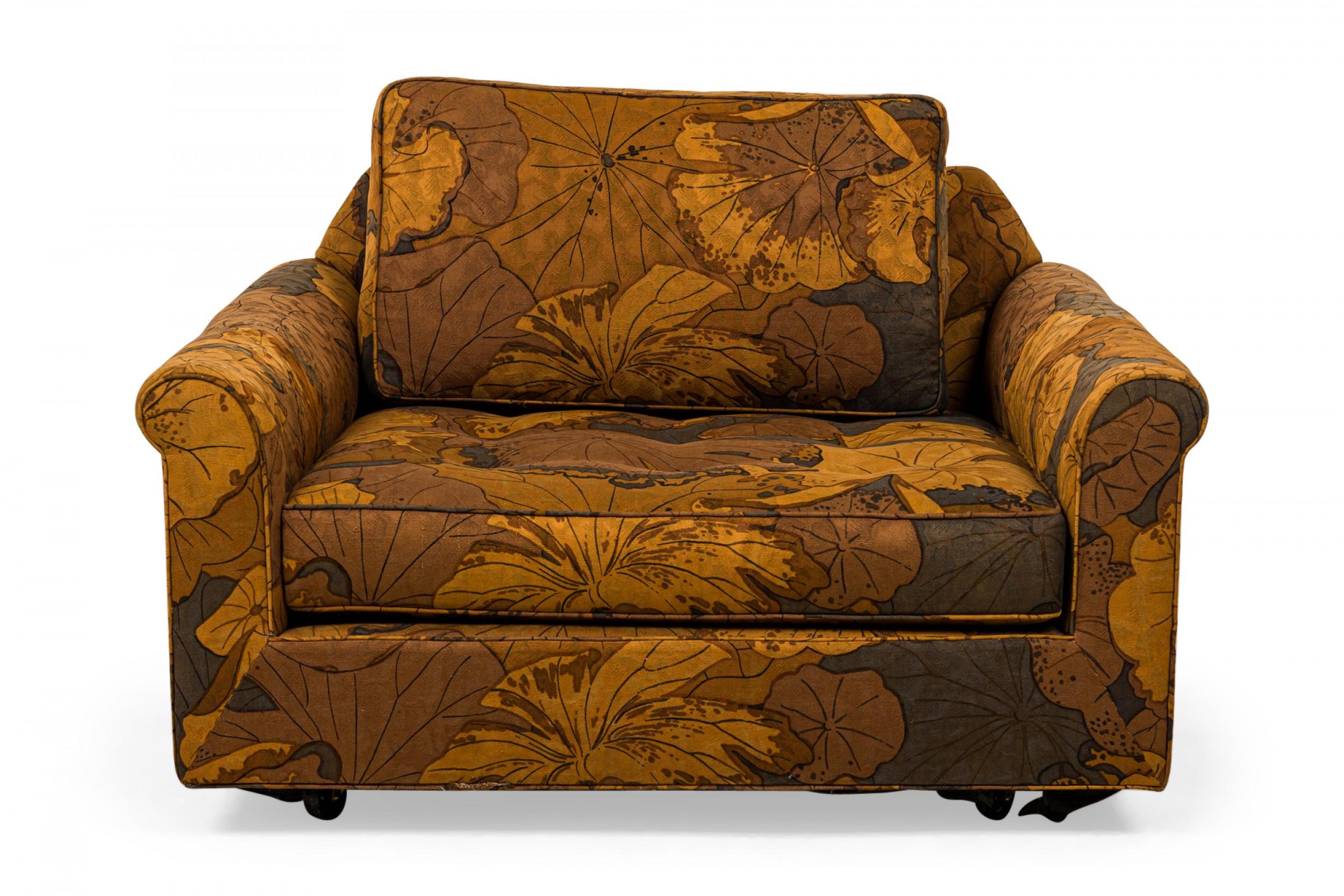 American Mid-Century 'Big Texan' form oversized lounge / armchair with brown leaf patterned fabric upholstery with removable back and seat cushions. (EDWARD WORMLEY FOR DUNBAR FURNITURE COMPANY).
 