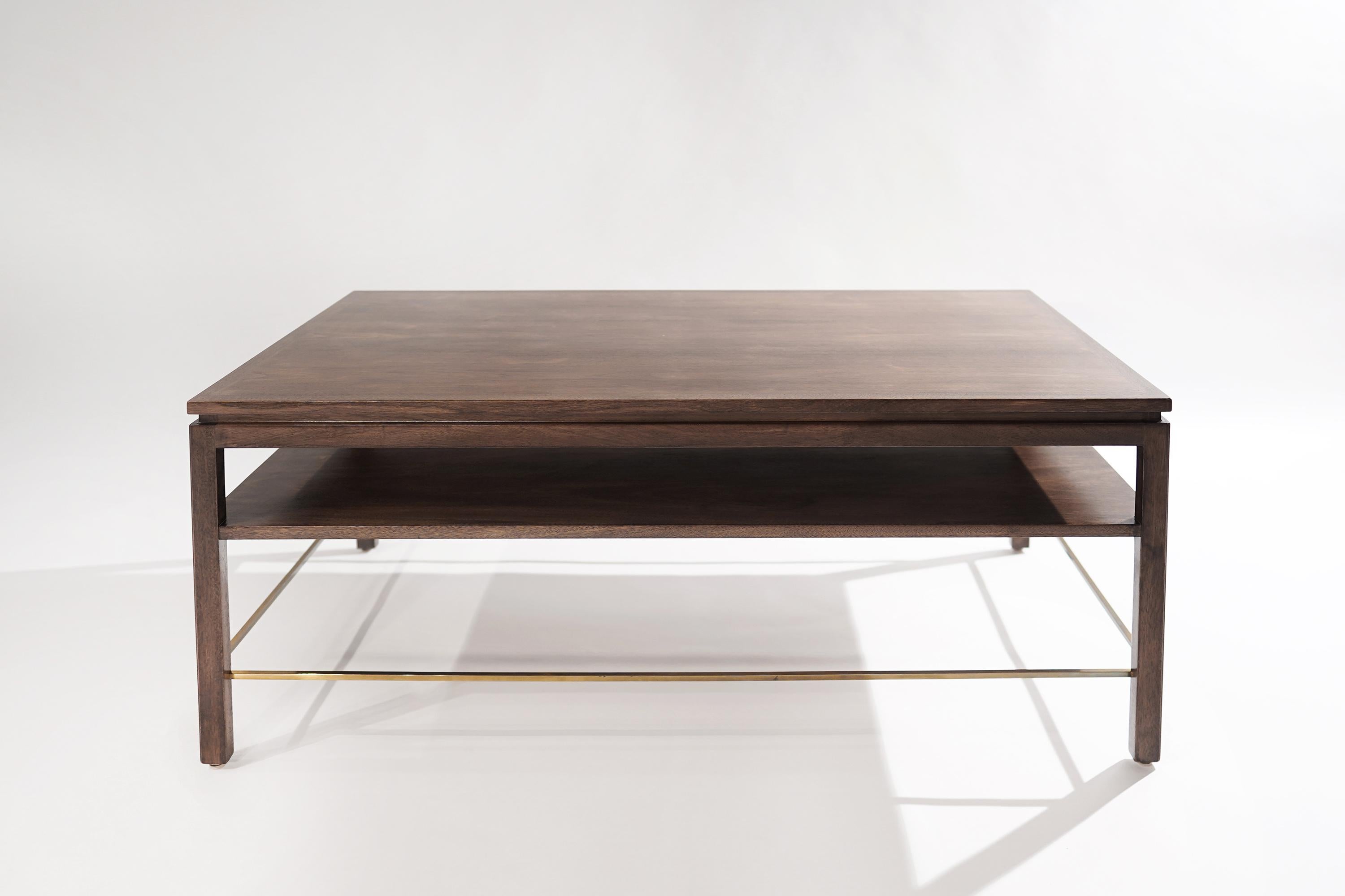 Walnut and mahogany coffee table designed by American icon Edward Wormley for Dunbar Furniture, Grand Rapids, Michigan, circa 1950-1959. Completely restored to its original integrity, featuring hand-polished brass stretchers.

Other designers of