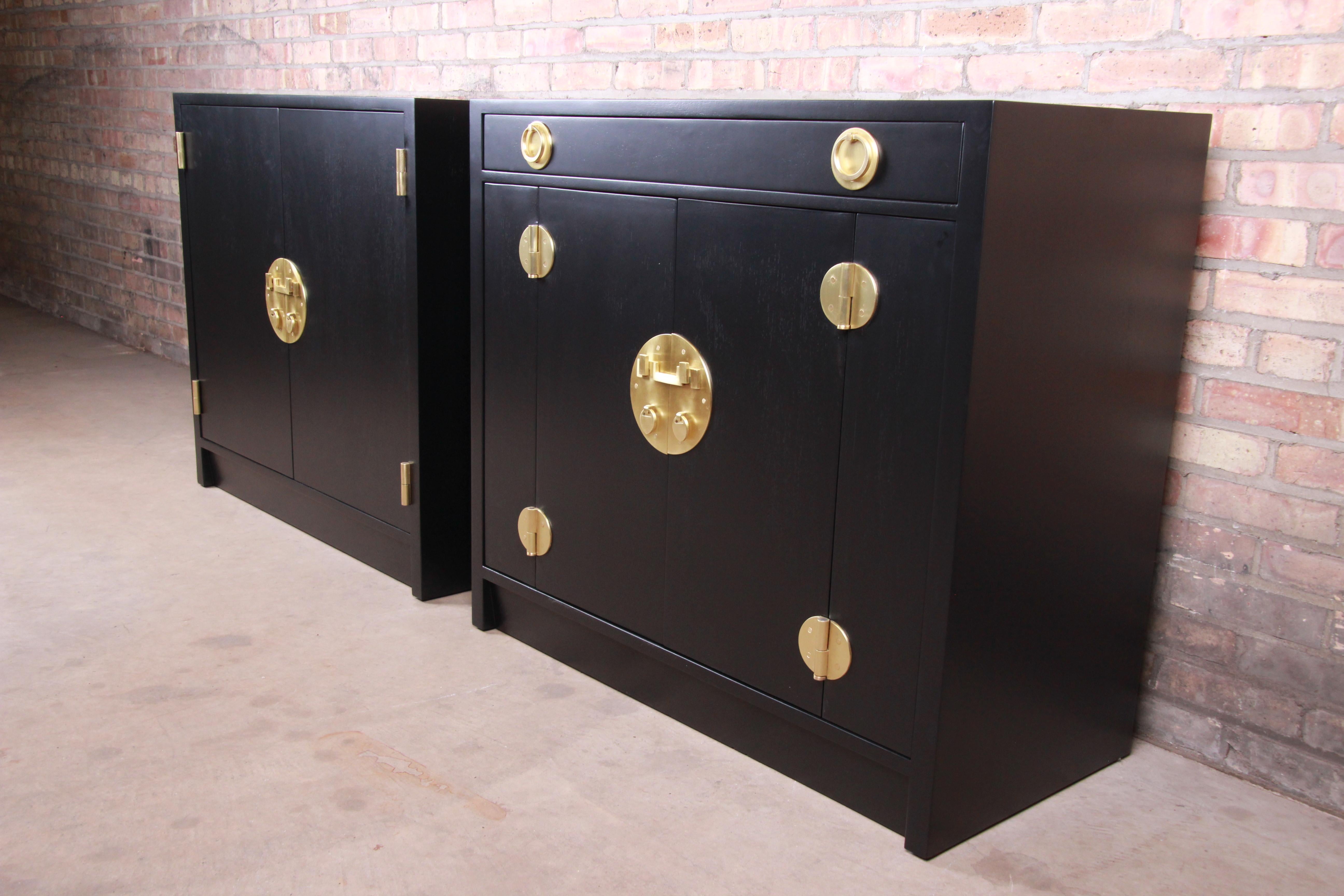 An exceptional pair of Mid-Century Modern Hollywood Regency chinoiserie compact credenzas, sideboard buffets, or bar cabinets

By Edward Wormley for Dunbar Furniture 