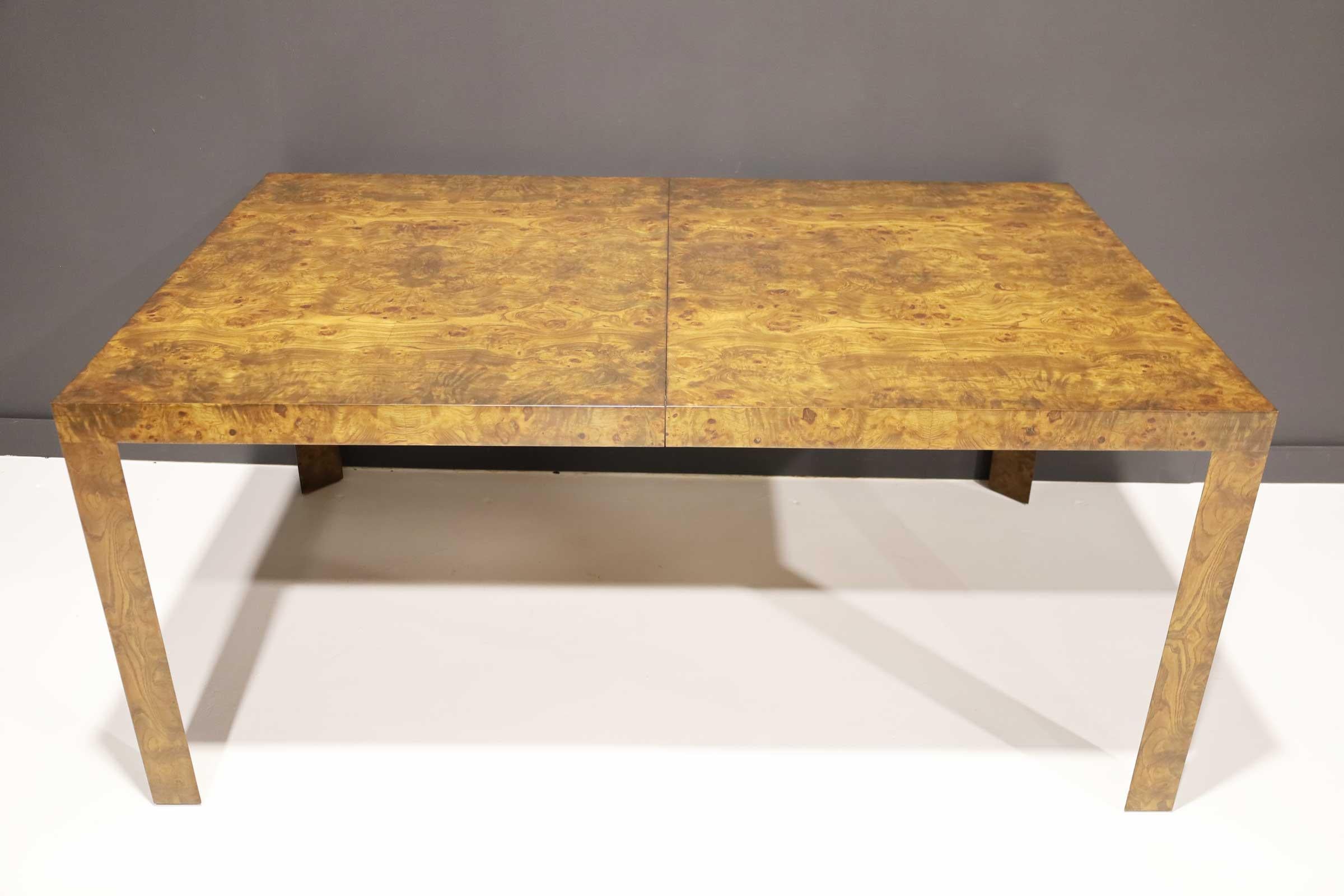 A classic parsons style dining table by Edward Wormley for Dunbar. Table has two 18