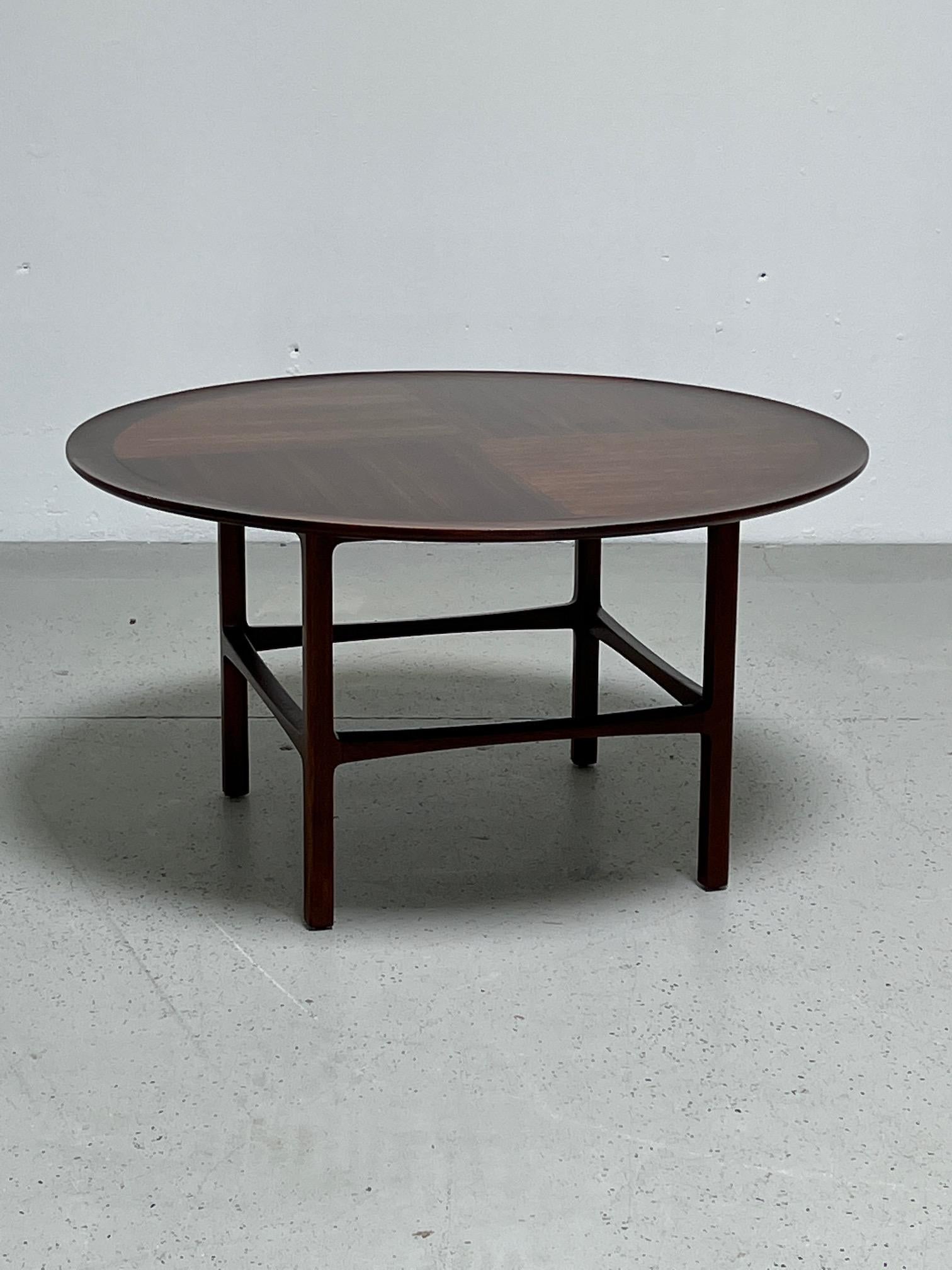 A tall cocktail table designed by Edward Wormley for Dunbar.