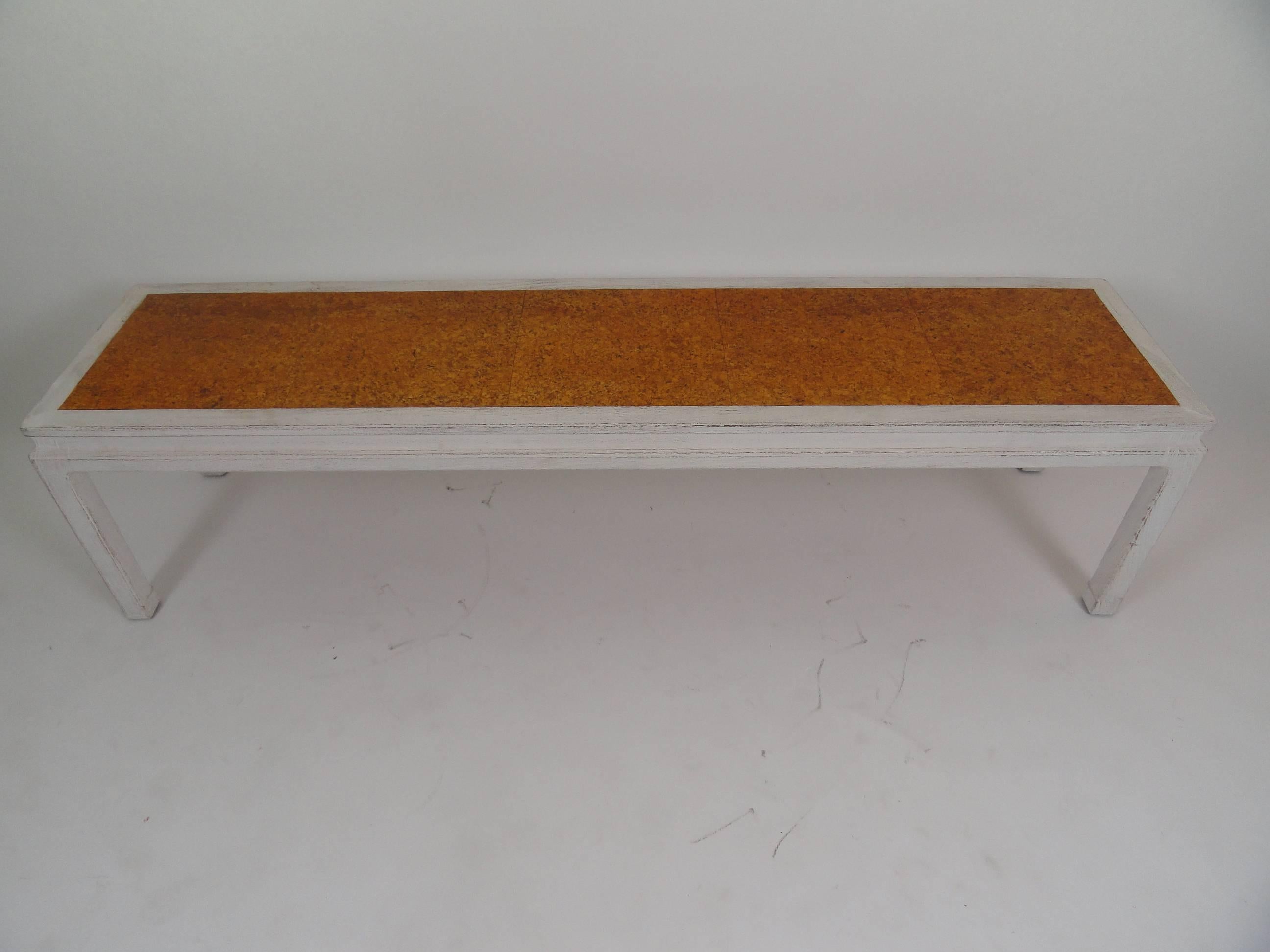 Modern Dunbar coffee table with cork top by Edward Wormley. Table has a rough wood finish with a brushed off-white painted finish. Tag on bottom.