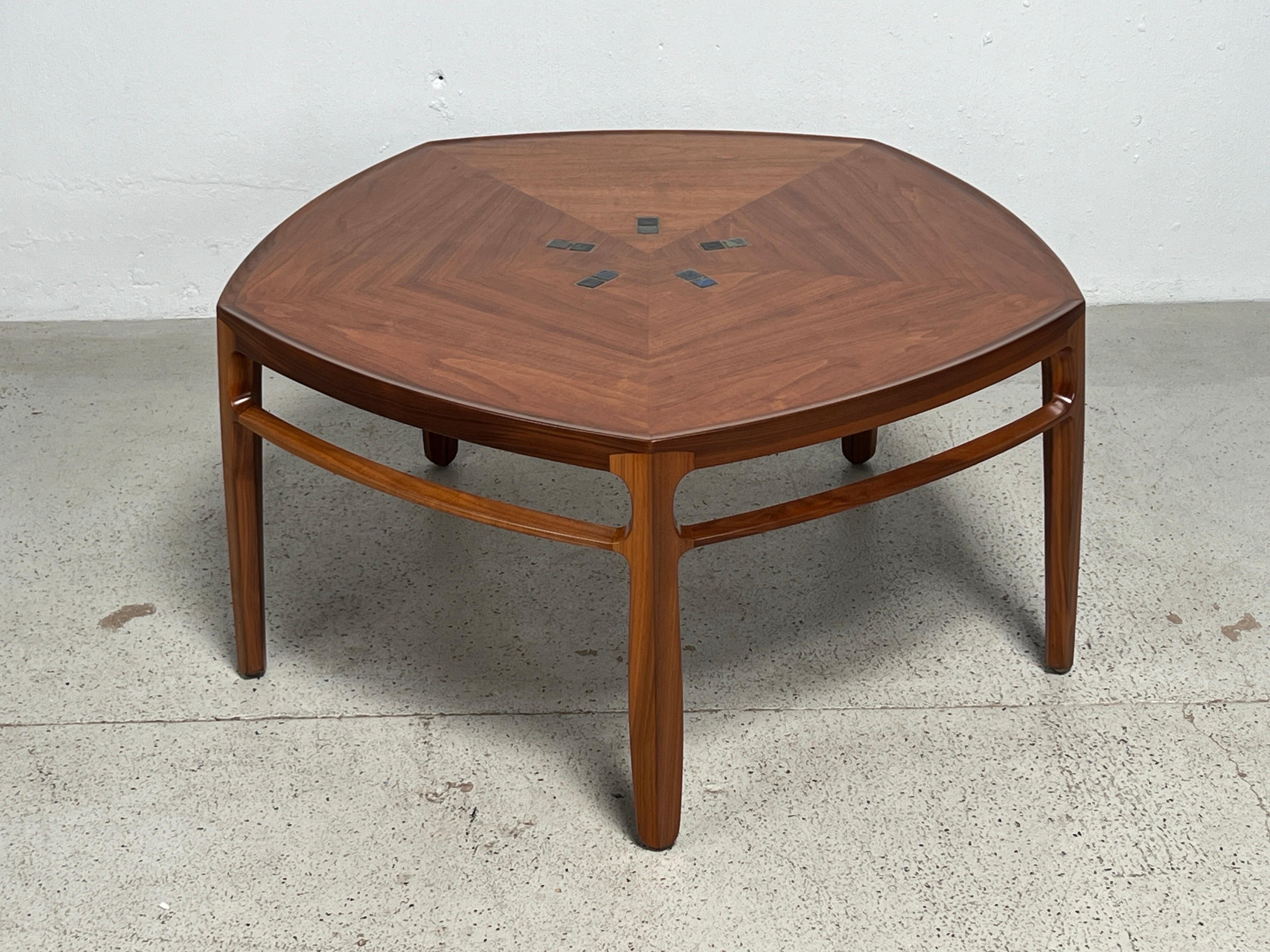 A walnut Janus coffee table with inset glass Tiffany tiles. Designed by Edward Wormley for Dunbar. 