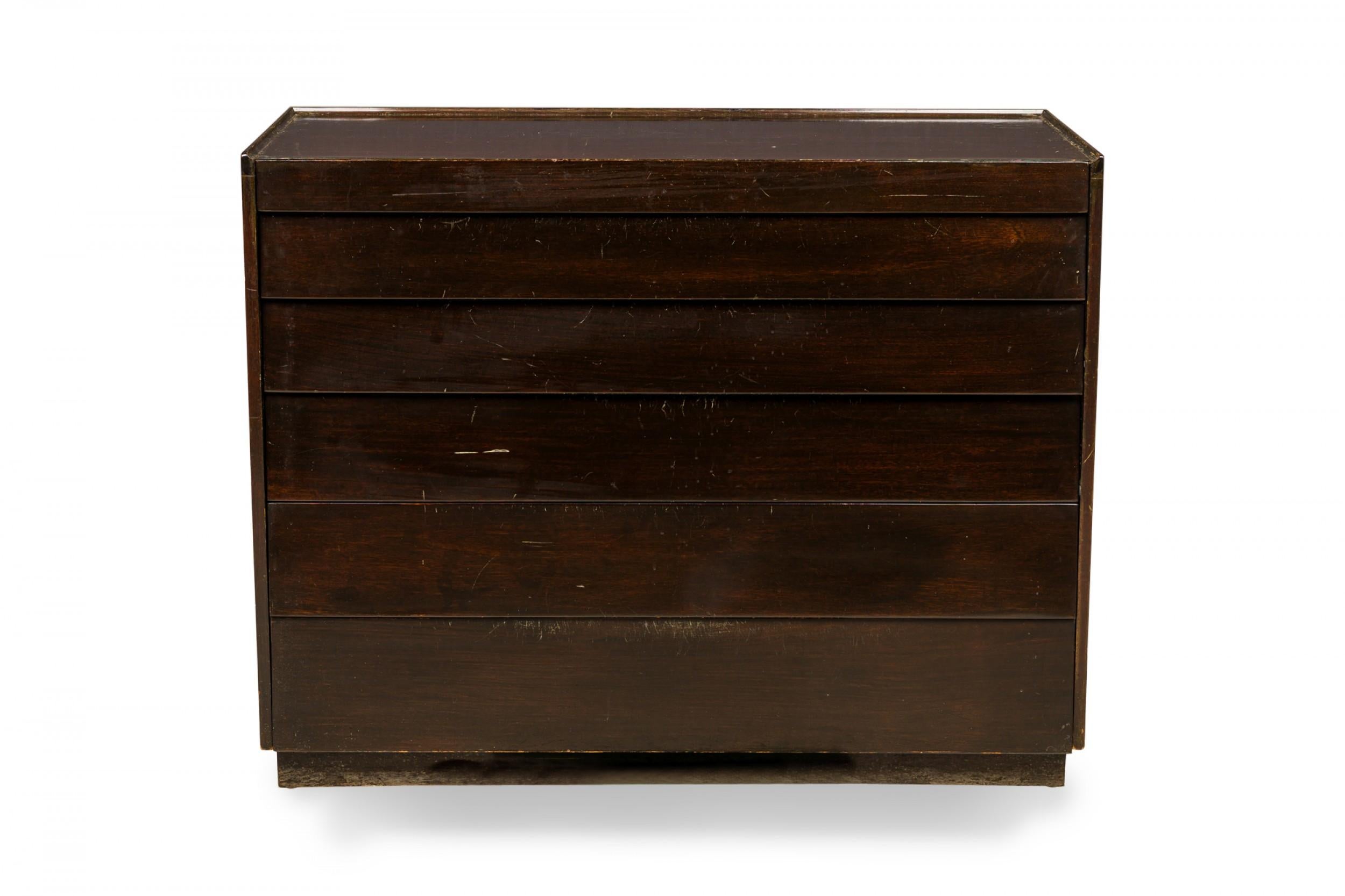 American Mid-Century 6-drawer walnut louver front commode / chest with a dark stained lacquered finish. (Edward Wormley for Dunbar Furniture Company).
    