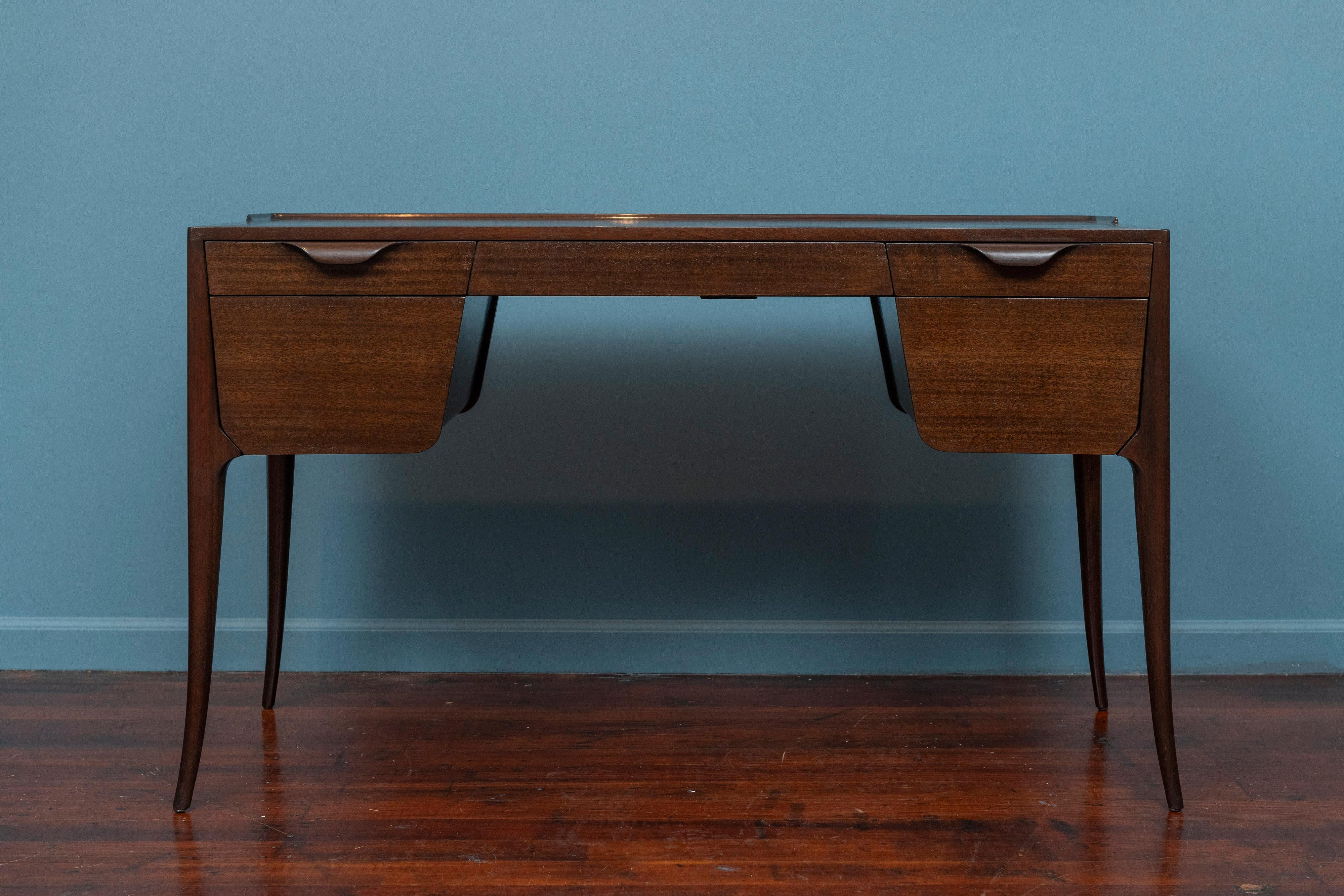 Edward Wormley design desk fro Dunbar, Model 4725. Elegant early design by Edward Wormley comprising five drawers, a gallery top trim and original black leather. Newly refinished and ready to install. Truly beautiful!
