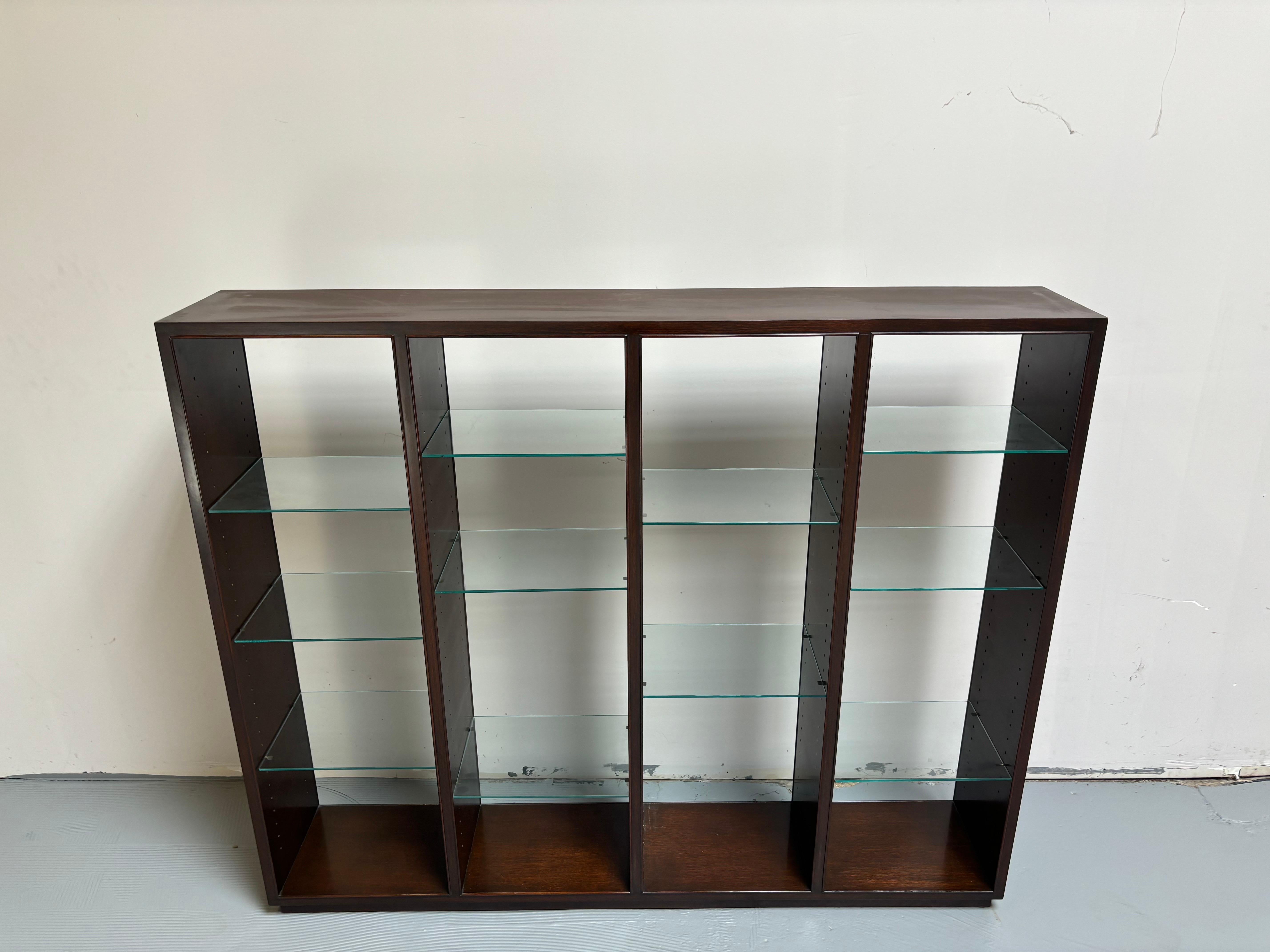 Edward Wormley for Dunbar Versatile Room Divider/ Display Shelf, Super-Structure Model number 5223  Designed to be used on top of a cabinet, or on the floor.  This simple elegant Piece is finished on all sides with adjustable glass shelves.  Set