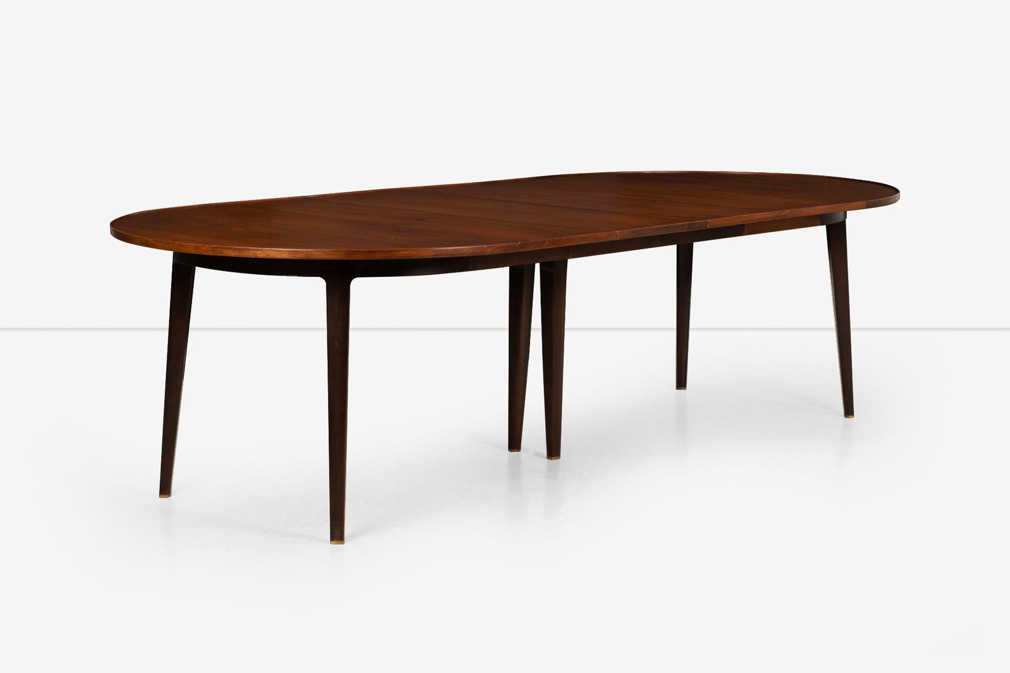 Edward Wormley for Dunbar Extension Dining Table. One-inch thick top with edge banding and a slight upward reveal or lip design detail shown in pictures. The table is 48