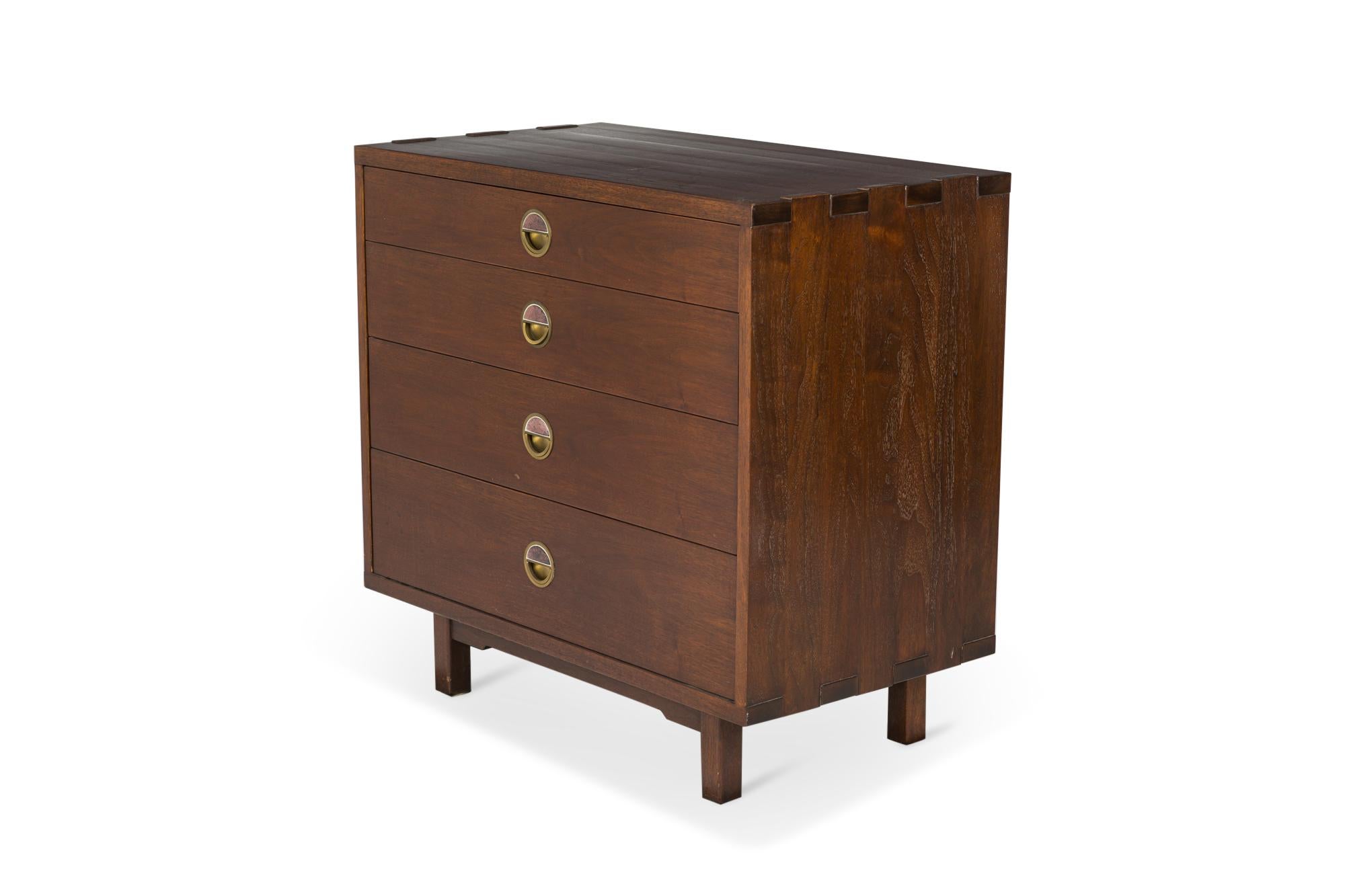American Mid-Century walnut four-drawer bachelor's chest with drawer pulls made of brass and Natzler ceramic half-moon burgundy tiles, resting on four square walnut legs. (