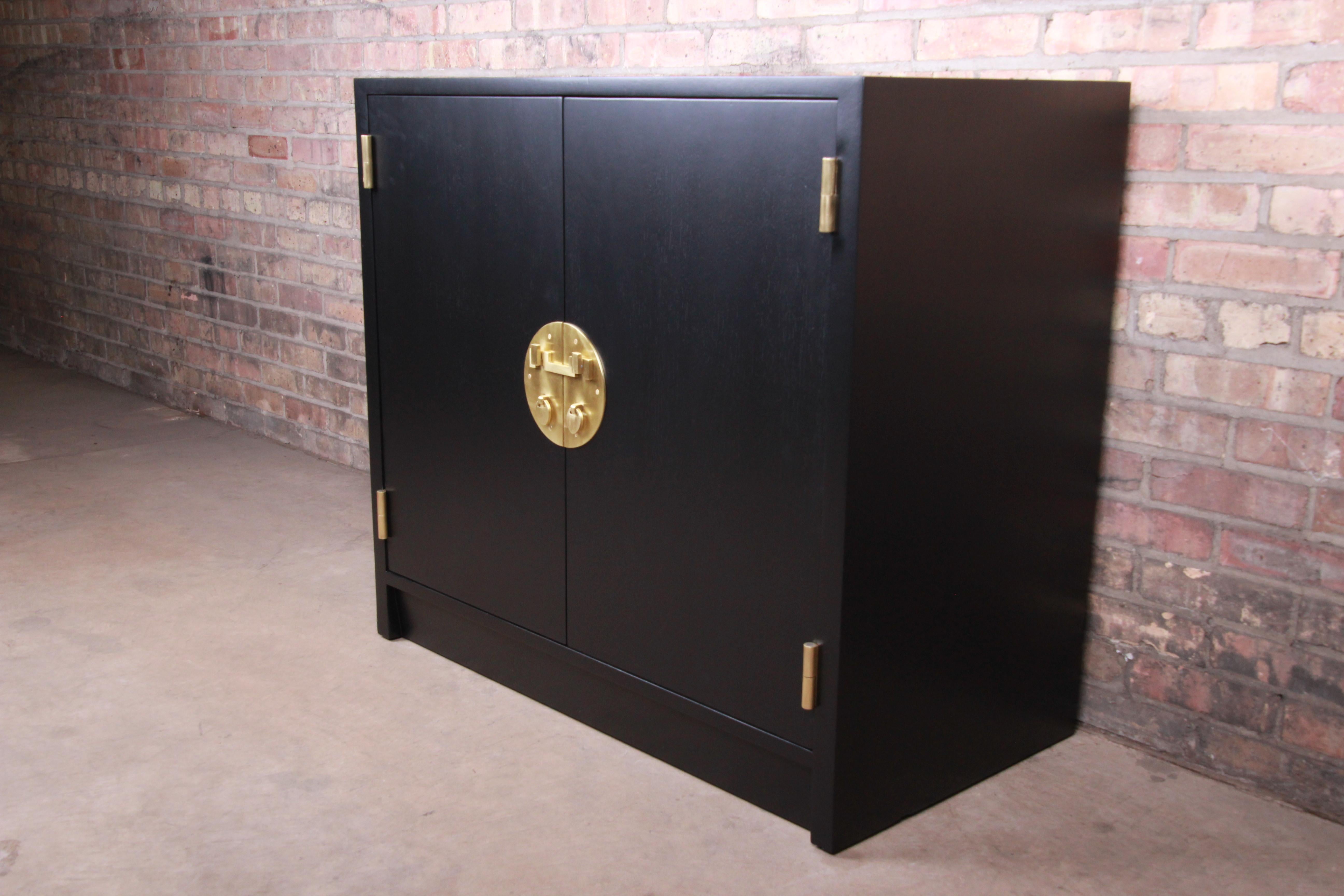 A gorgeous Mid-Century Modern Hollywood Regency chinoiserie compact credenza, sideboard buffet, or bar cabinet

By Edward Wormley for Dunbar Furniture 