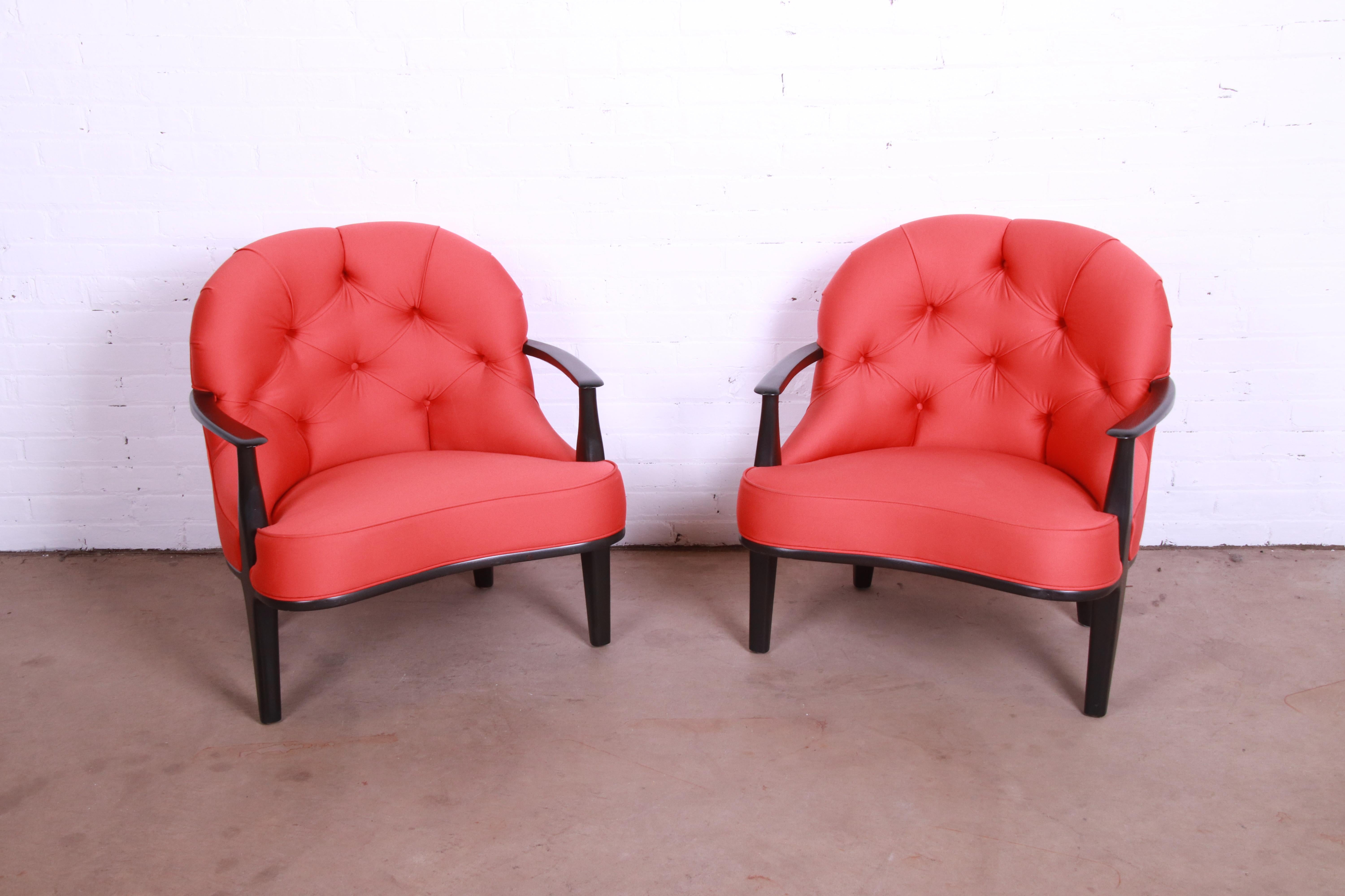 An exceptional pair of Janus Collection lounge chairs

By Edward Wormley for Dunbar

USA, 20th Century

Ebonized sculpted walnut arms and legs with an exposed frame, and red upholstery with a button tufted back and curved seat

Measures: