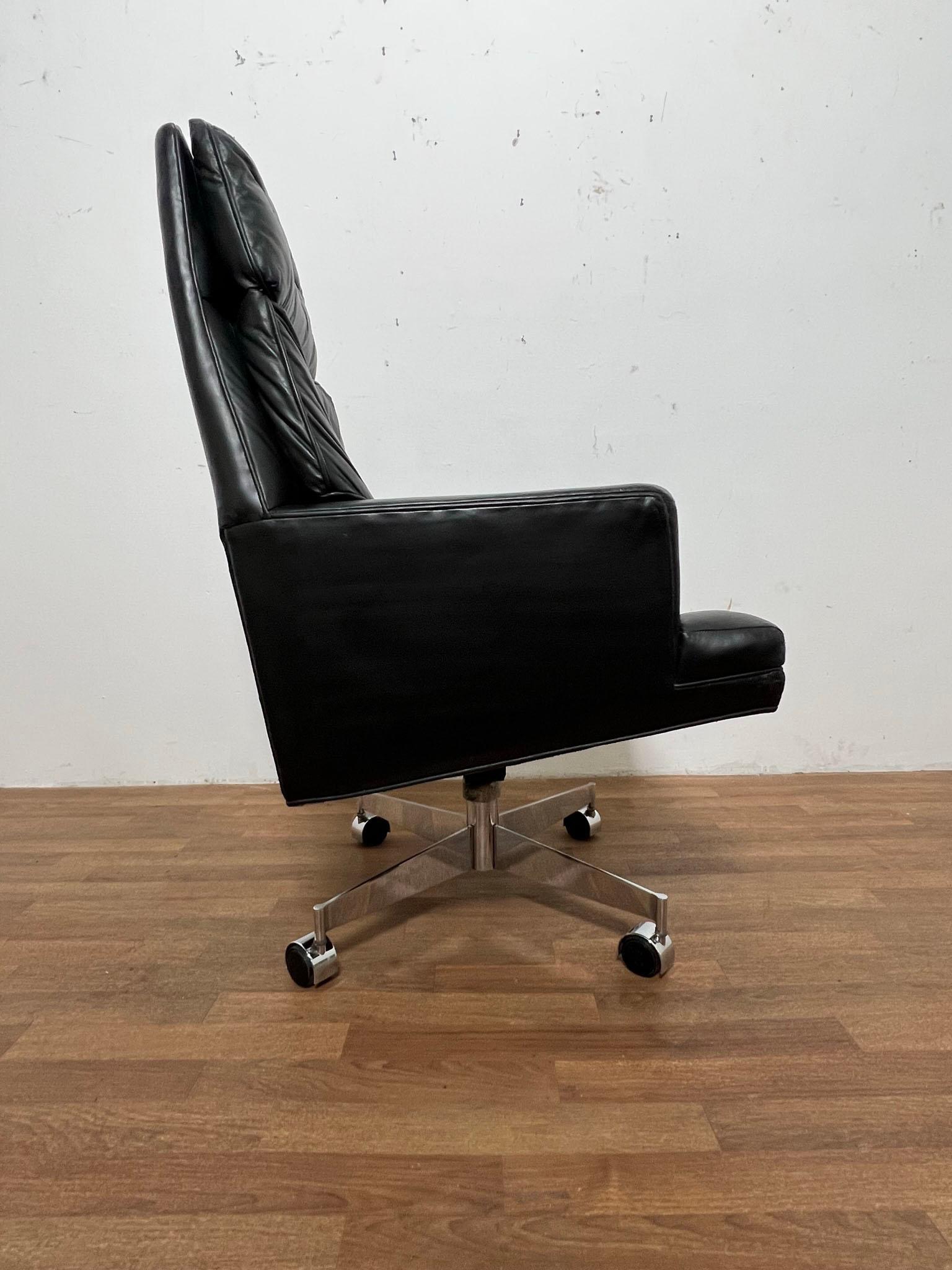 Leather executive swivel desk chair by Edward Wormley for Dunbar, circa 1950s.
