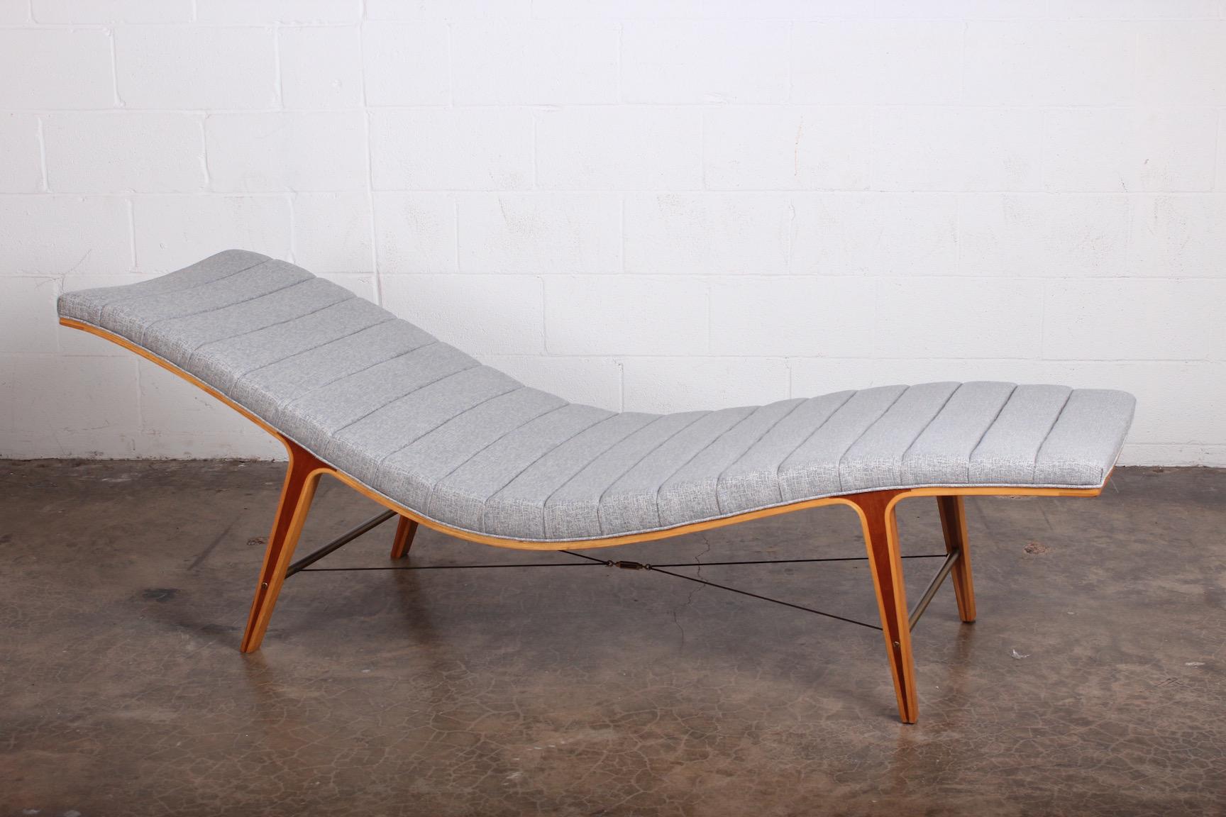 A very rare deign by Edward Wormley for Dunbar. The Listen-To-Me chaise model 4873 has a base of maple and cherry with brass stretchers and a steel turnbuckle.