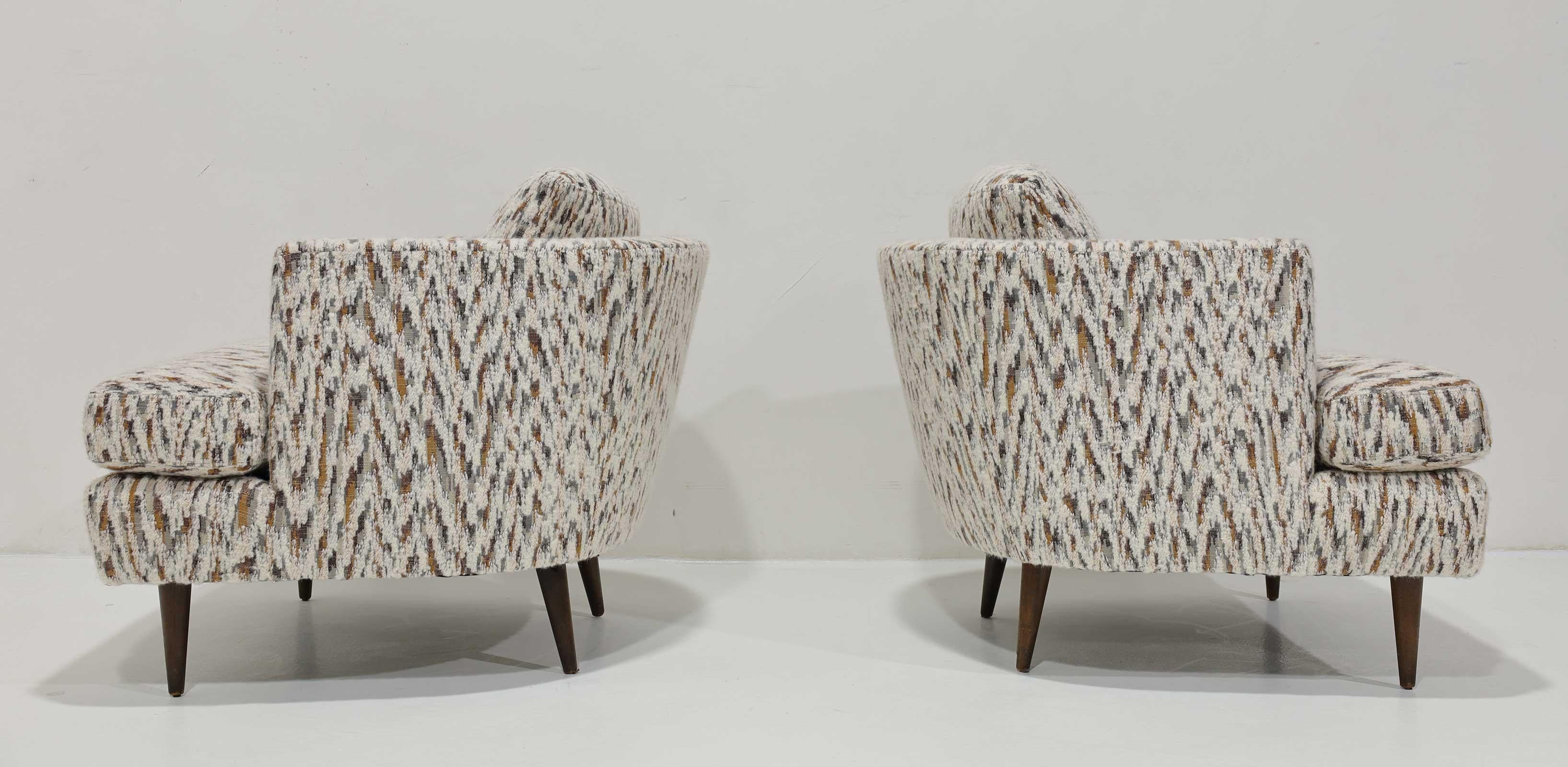 Beautiful and comfortable pair of Edward Wormley for Dunbar lounge chairs newly upholstered in a Holland & Sherry luxury wool. Stunning!