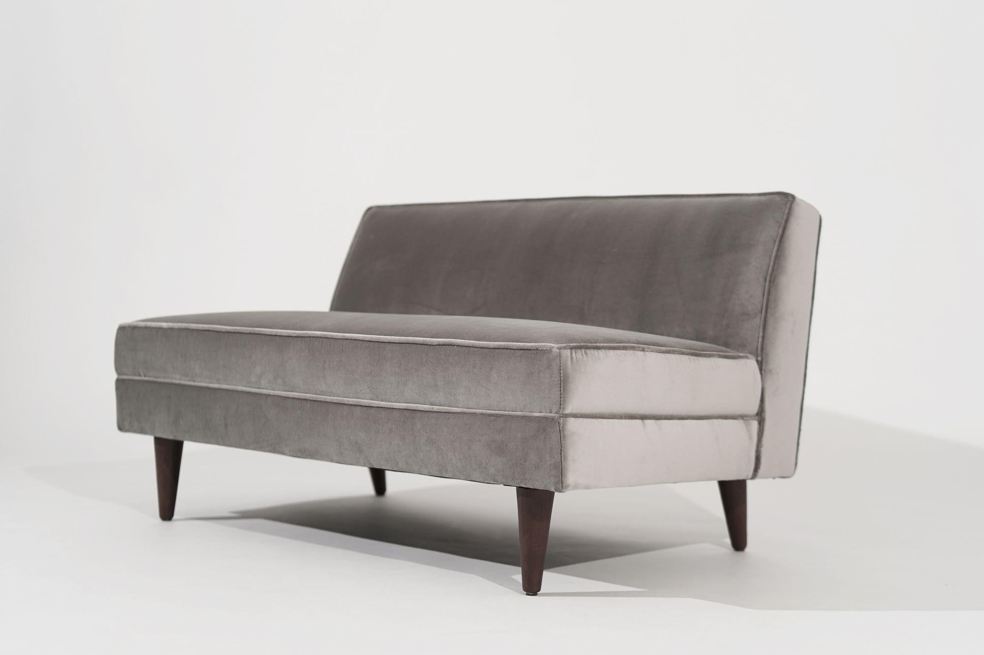 Mid-Century Modern Loveseat designed by Edward Wormley for Dunbar, circa 1950-1959. Completely restored and reupholstered in grey cotton velvet by Holly Hunt.
 


Other designers from this period include T.H. Robsjohn-Gibbings, Hans Wegner, Gio