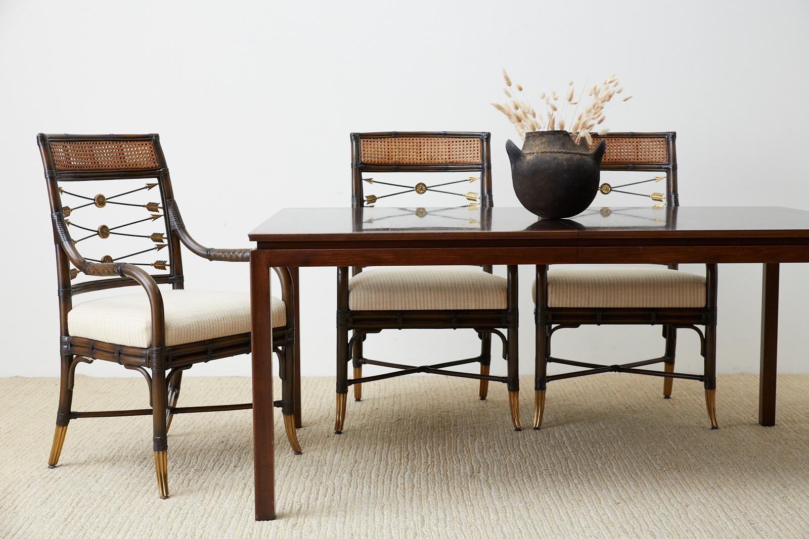 Mid-Century Modern dining table with two extending leaves designed by Edward Wormley for Dunbar. Constructed from mahogany featuring two finishes, one medium and one dark on top. The frame has sculpted legs with an Asian flare known as the Janus